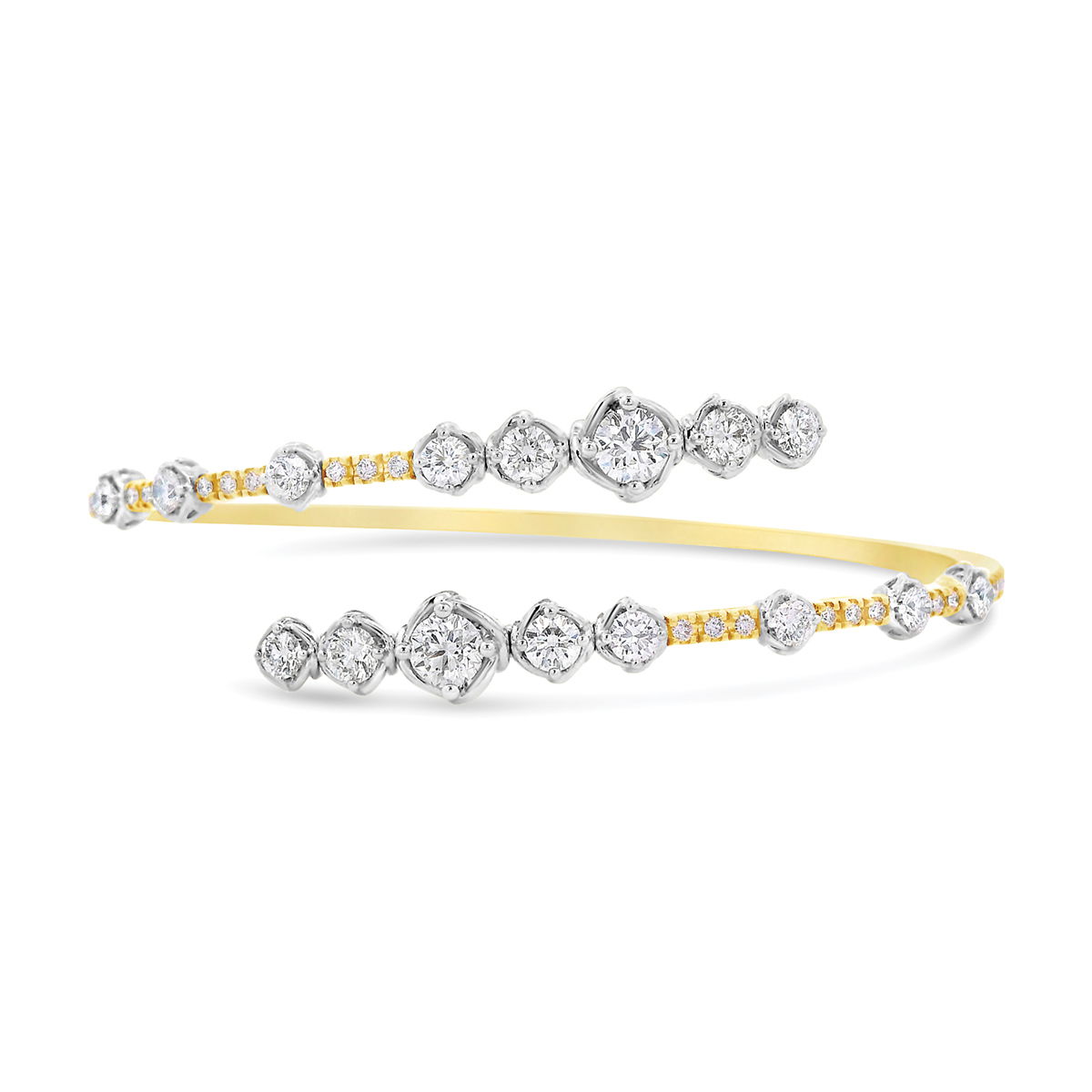 Elegance meets modern design in this diamond bypass bracelet, featuring a sleek twist bezel setting that enhances each diamond’s brilliance. The graceful bypass style adds a touch of movement, making this piece a timeless statement of sophistication.-18k Two tone gold-Round diamonds, 3.07ctsItem# 170-2000016 Bypass Bangle