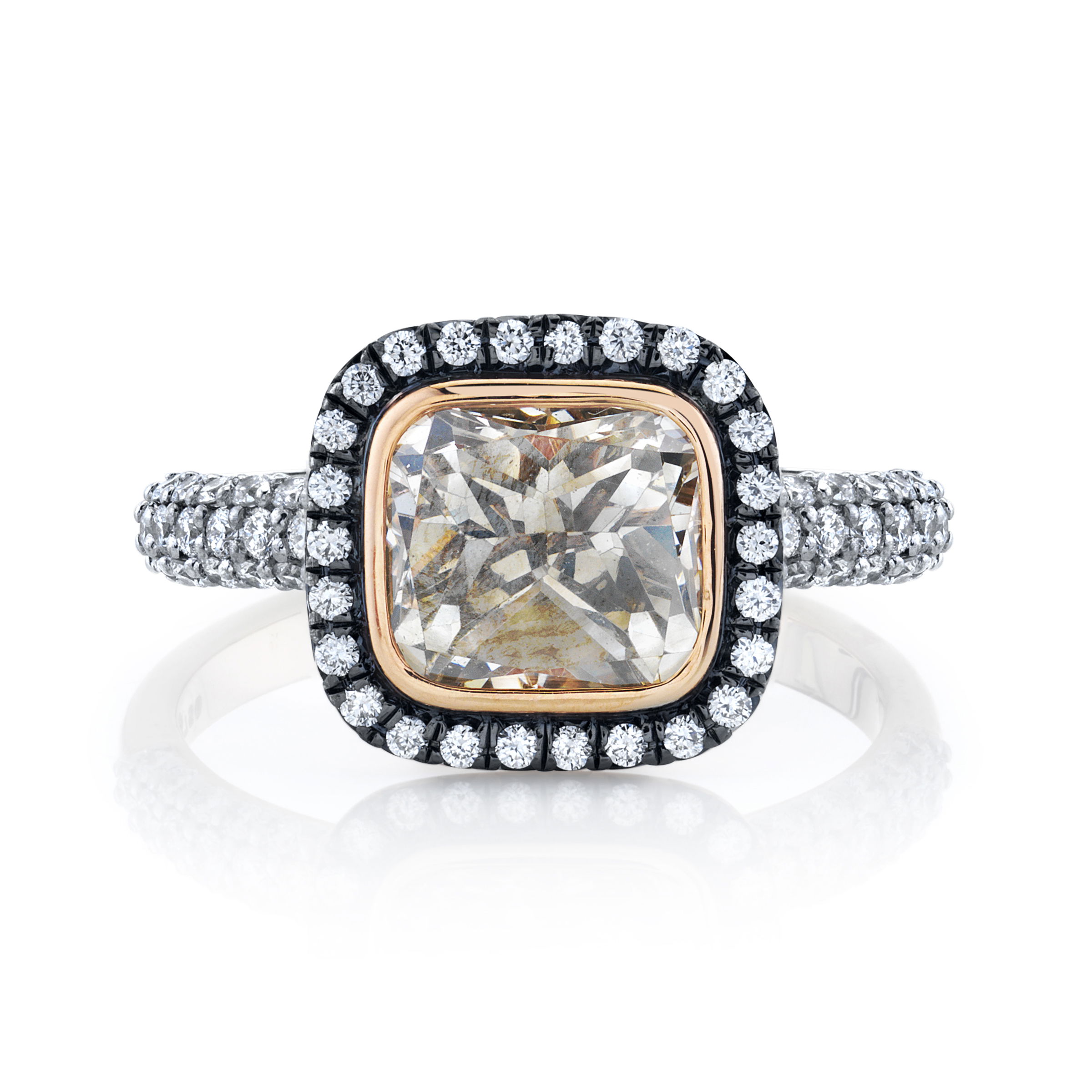 Designed by skilled artisans in Southern California, this piece catches the light with every movement, adding a touch of brilliance to your any look.-18k Rose gold-Cushion grey diamond, 1.85ct-Round white diamonds, 0.47cts-Size 6.5Item# 804-2000132 Grey Diamond Ring with White Diamond Dropped Halo & Triple Row White Diamond Band