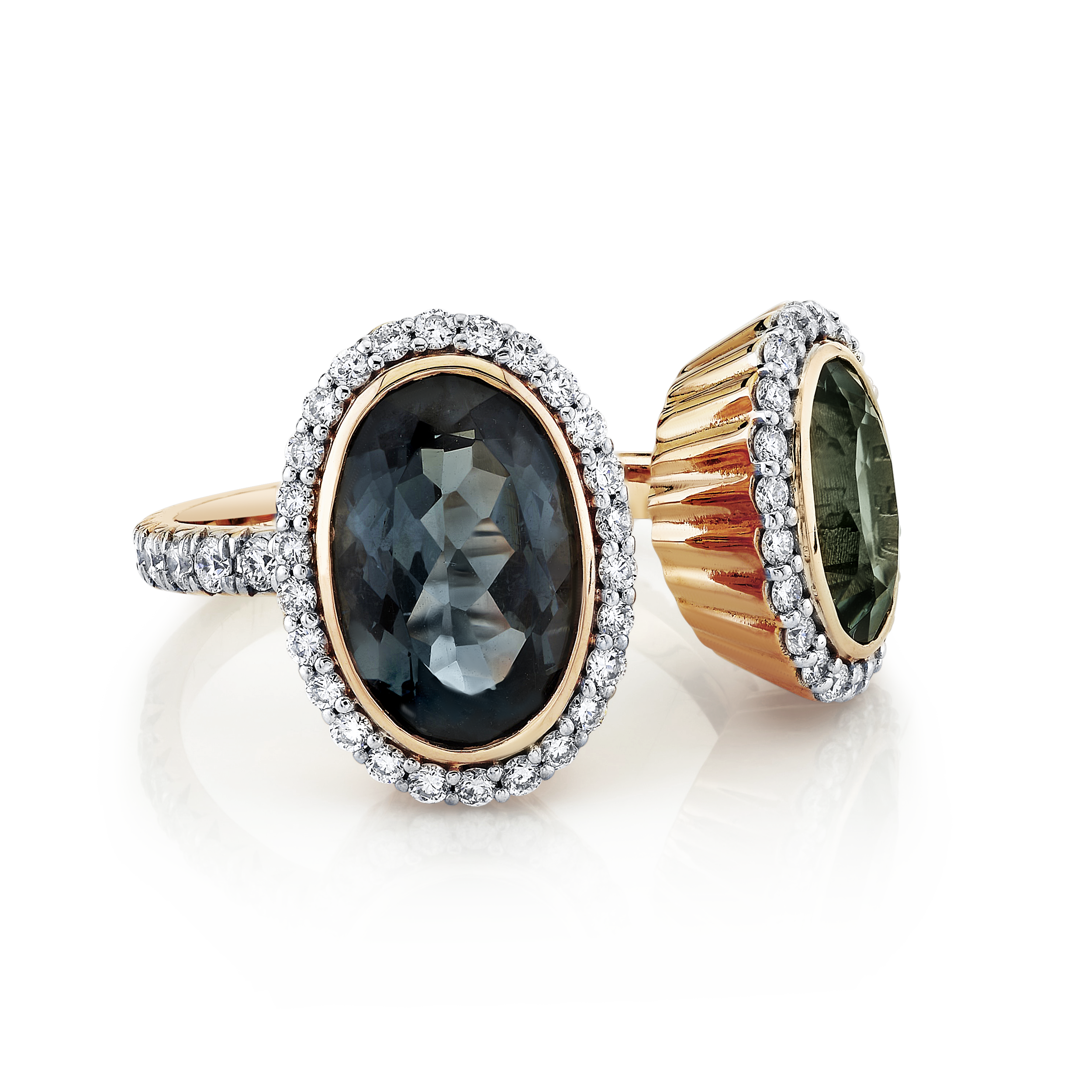 Crafted in Southern California, this bold piece is a true standout, offering a design that’s both eye-catching and sophisticated.-18k Rose gold-Oval grey tourmaline, 5.08cts-Round white diamonds, 0.72cts-Size 7Item# 804-2000138 Grey Tourmaline & Rose Gold Double Oval Ring with White Diamond Detail