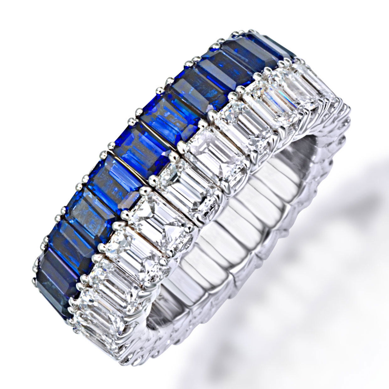 This white gold and sapphire ring is the definition of elegance and luxury. Picchiotti’s Xpandable collection brings a new standard of comfort to fine jewelry, featuring rings and bracelets that effortlessly expand for a perfect fit. -White gold-Octagonal sapphires-Emerald cut diamondsItem# 200-2000035 Xpandable Emerald and Sapphire Band Ring