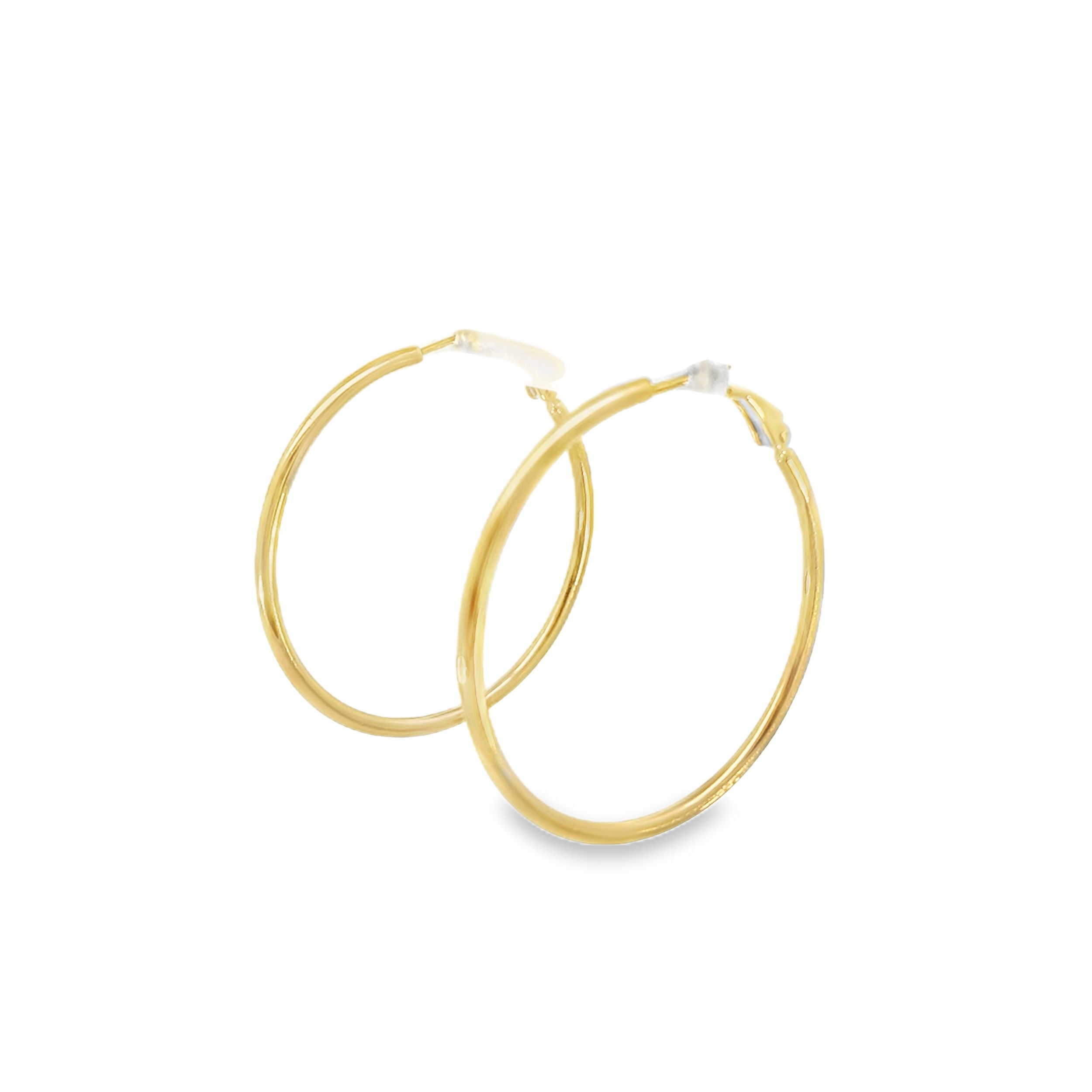 These sleek hoop earrings in 18k yellow gold feature a tension spring closure for effortless wear and a secure fit. Their polished finish and classic silhouette make them a versatile addition to any jewelry collection.-18k Yellow goldItem# 805-2000284 Designer Hoop Earrings