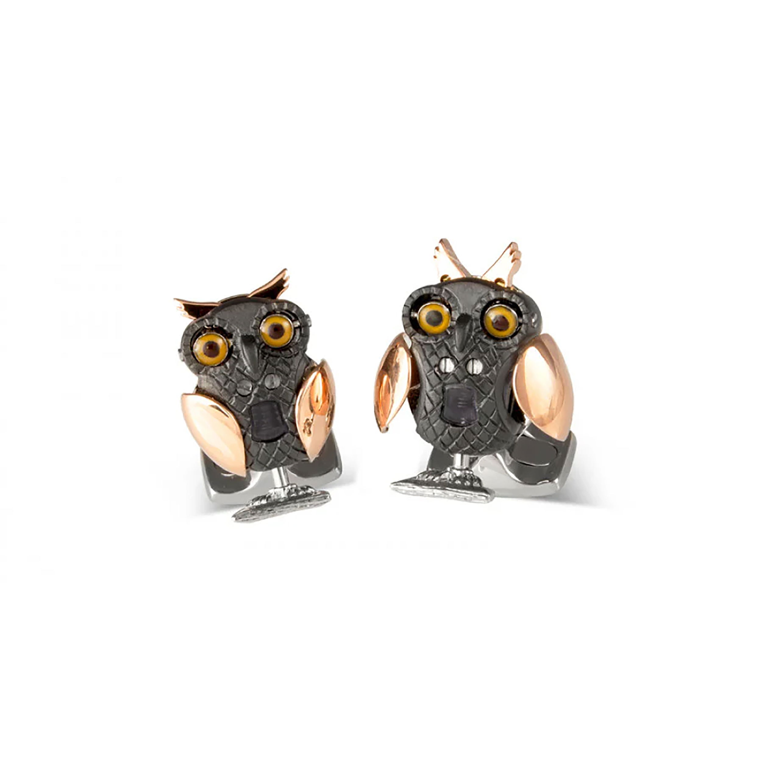These Deakin & Francis Owl cufflinks are expertly handcrafted in sterling silver and embellished with hand-applied brown enamel, featuring striking blue cabochon sapphire eyes for a rich, refined finish. The playful yet sophisticated owl motif beautifully blends artisanal craftsmanship with a distinctive whimsical elegance.-Sterling silver-EnamelItem#800-2000019 Owl Cufflinks