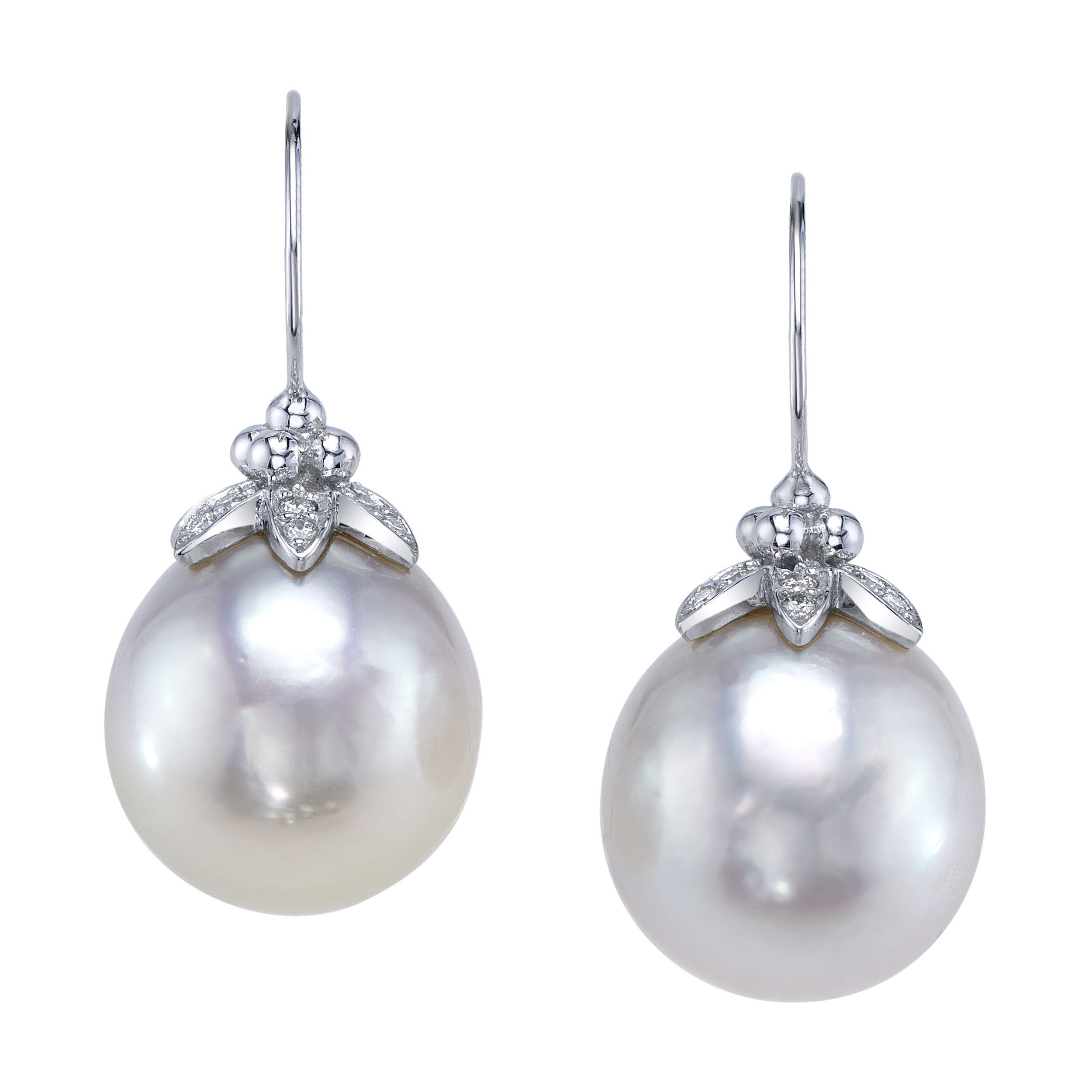 These pearl earrings, set in 18k white gold, offer a timeless blend of sophistication and elegance. Their sleek design makes them perfect for both everyday wear and special occasions, adding a touch of classic beauty to any outfit.-18k White gold-South sea pearlItem# ND-EAR-00007 Bette Earrings