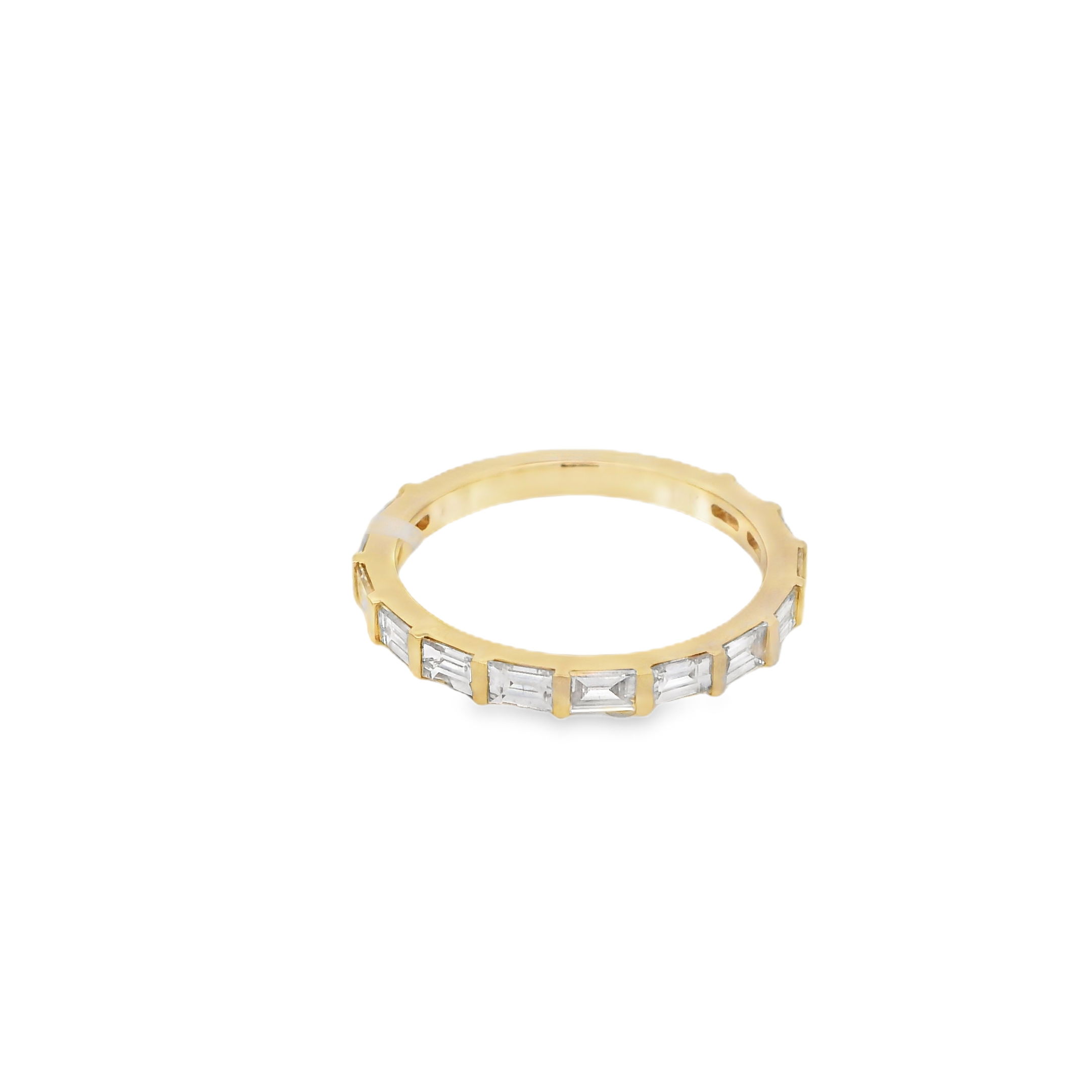This sleek 18k yellow gold wedding band features bar-set baguette diamonds, offering a clean, modern look with continuous sparkle. The straight lines and precise setting highlight the elegance of the diamonds, making it the perfect complement to any engagement ring or a stunning standalone piece. -18k Yellow gold-Baguette diamonds, 0.84cts-Size 6.5, Contact for sizing optionsItem# 110-2000016 East West Wedding Band