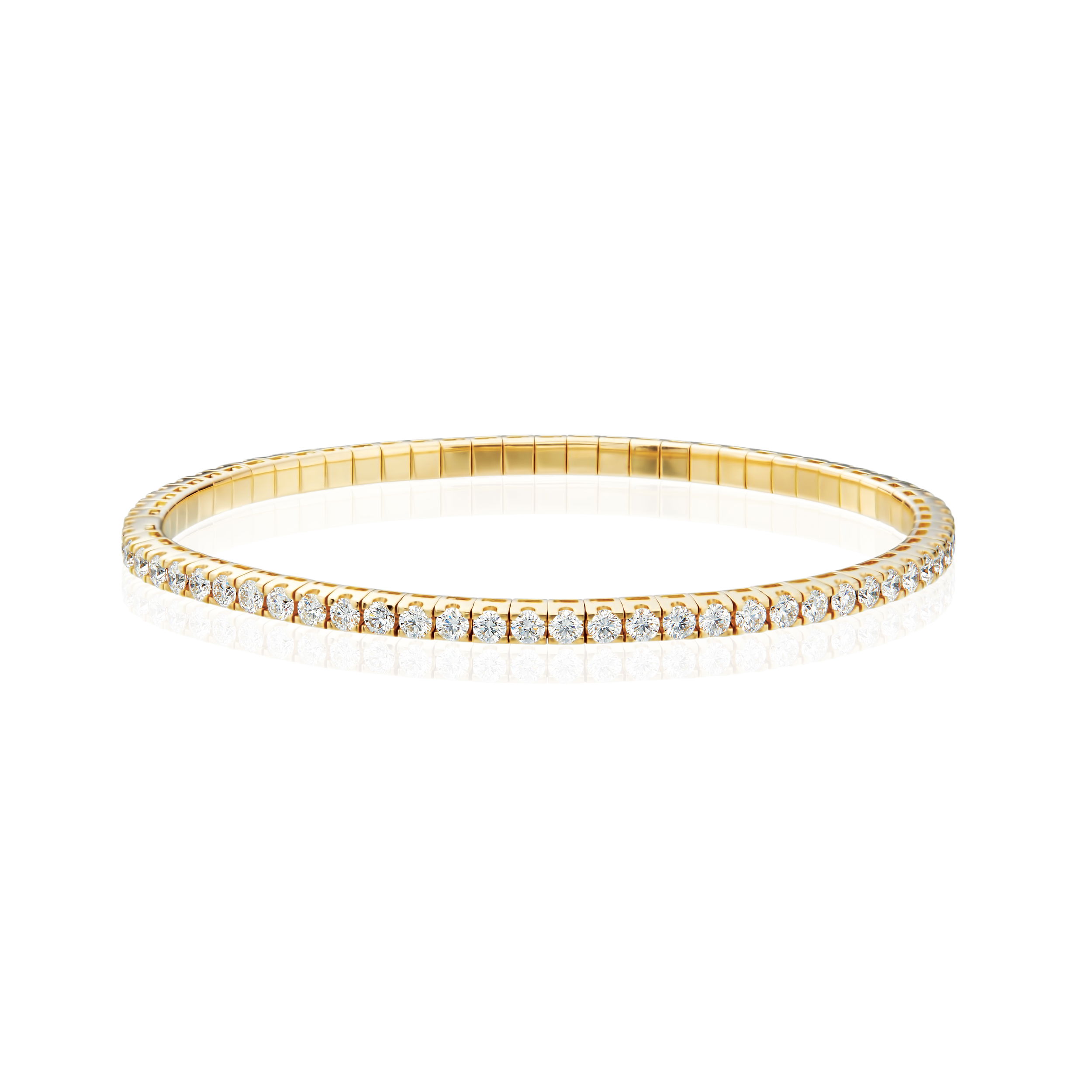 Effortlessly stylish and comfortable, this stretch bangle offers a perfect blend of elegance and ease. Designed for a flexible fit, it seamlessly slides onto the wrist while maintaining a sleek and polished look. -18k Yellow gold-Round diamonds, 2.30ctsItem# 808-2000145 Diamond Stretch Bangle
