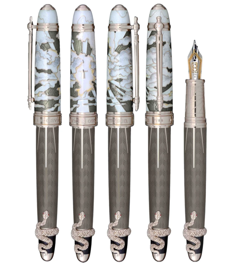 The Deus Regit by David Oscarson is a limited-edition masterpiece, with only 88 pieces crafted. This luxurious fountain pen combines art and function, featuring intricate designs in sterling silver with rich Gold Vermeil accents. Perfectly balanced for an exceptional writing experience, the Deus Regit is a symbol of exclusivity and sophistication. Whether as a personal indulgence or a distinguished gift, this pen embodies elegance and style, elevating your writing to new heights.-Sterling Silver-Gold Vermeil-Enamel-Item# 750-2000023 Deus Regit Pen 4/88