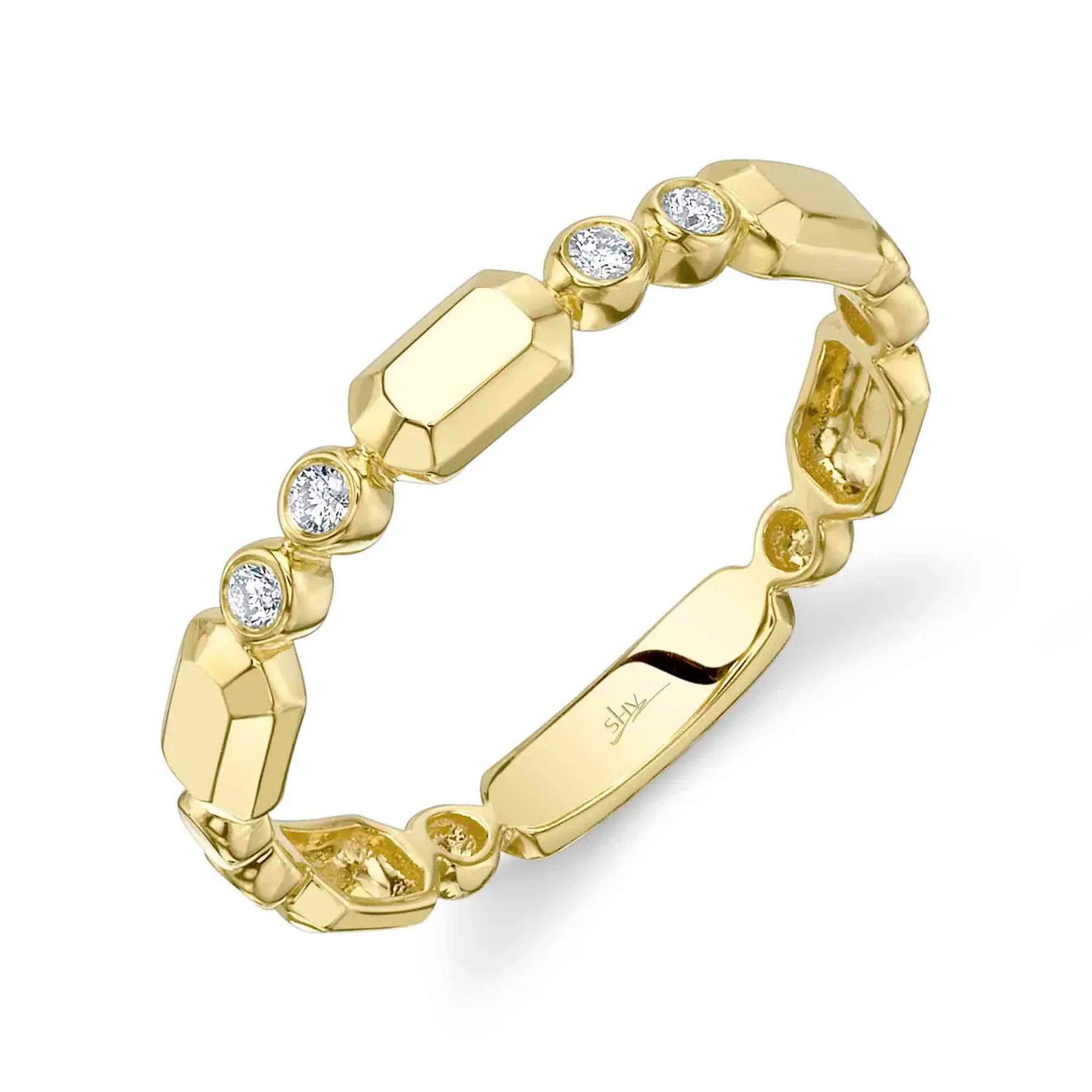 Versatile and stackable, this piece ensures you’ll stand out whether it’s a casual day or a special night. All Shy Creation diamonds are natural and hand-selected. All stones are unique and hand set. As a result, you can expect slight variations in the shade, hue, tint of the color stones and stone count.-14k Yellow gold-Round diamonds, 0.06cts-Dimensions, 3.1mm-Size 7Item# 804-2000158 Diamond Bezel Geo Cut Band