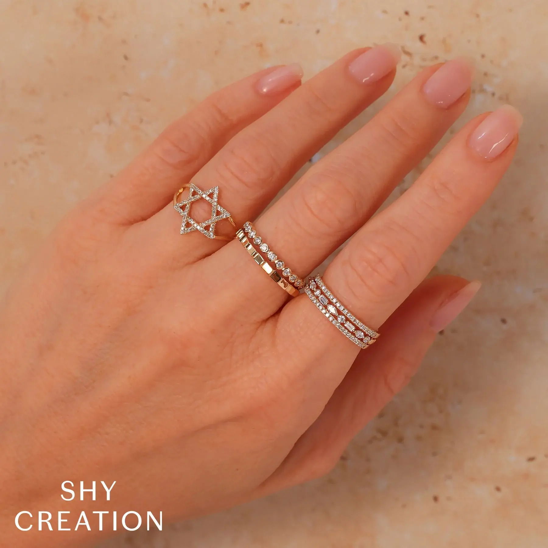 Experience both luxury and comfort with this timeless piece, designed for everyday elegance. All Shy Creation diamonds are natural and hand-selected. All stones are unique and hand set. As a result, you can expect slight variations in the shade, hue, tint of the color stones and stone count.-14k White gold-Round diamonds, 0.28cts-Marquise diamonds, 0.10cts-Baguette diamonds, 0.09cts-Dimensions, 5.0mm-Size 7Item# 804-2000159 Diamond Baguette Marquise Band