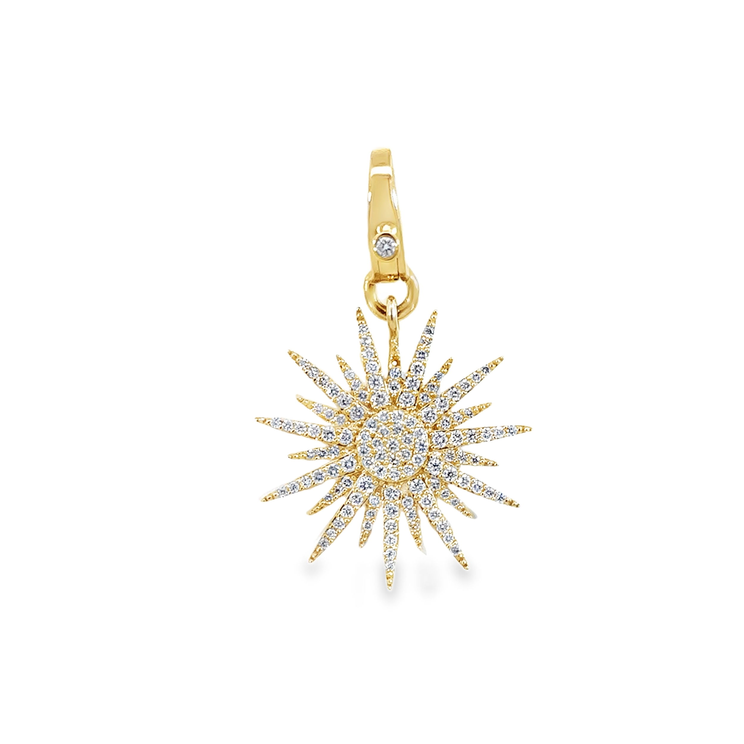 This pave diamond sunburst charm radiates brilliance with its intricate design and sparkling diamonds. Featuring a convenient lobster clasp attachment point, it includes a diamond-accented lever for an extra touch of elegance. Perfect for wearing alone or adding to a collection of charms for a personalized look.-14k Yellow goldItem# 806-200008 Yellow Gold Diamond Starburst Pendant