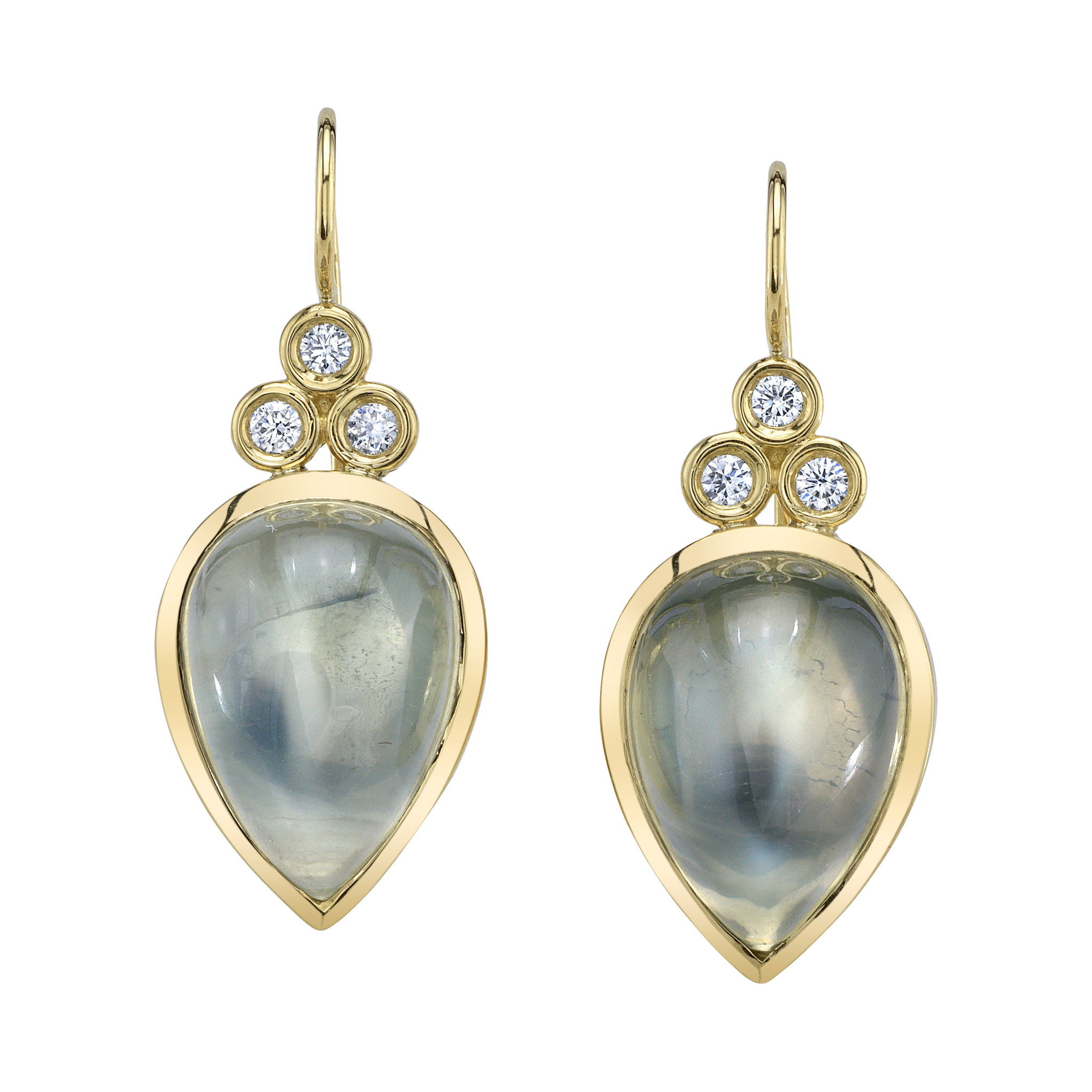 These earrings feature pear-shaped moonstones framed in 18k yellow gold and accented with diamonds for a soft, luminous glow. With their subtle shimmer and celestial feel, they bring a touch of the ethereal to any look.-18k Yellow gold-Green pear shape moonstone-Diamonds, 0.12ctsItem# ND-EAR-00013 Green Moonstone Earrings