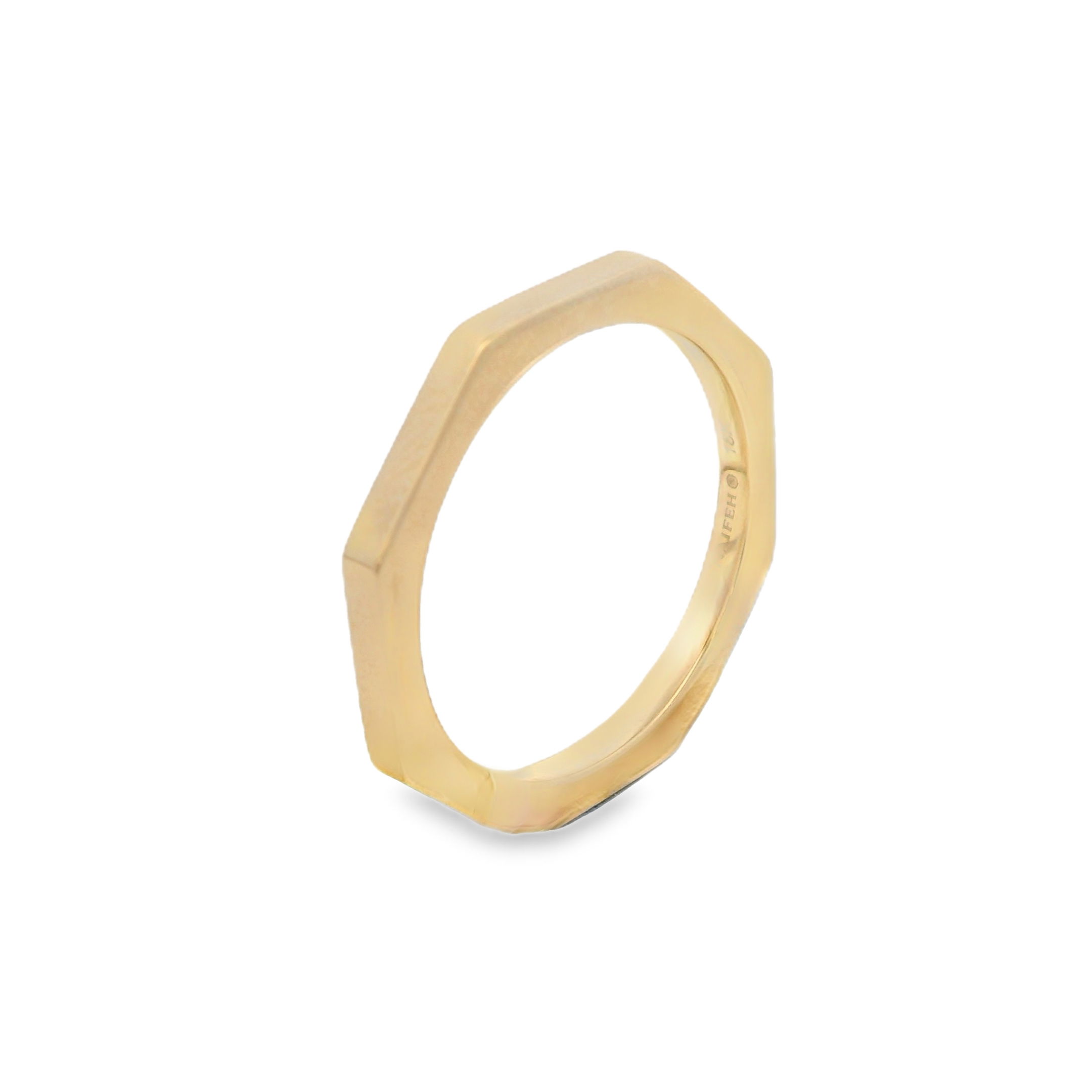 This distinctive plain 18k yellow gold wedding band features a unique octagon profile, offering a modern and bold twist on a classic design. Its geometric shape adds character and sophistication, making it a perfect choice for those seeking a timeless yet contemporary symbol of love and commitment.-18k Yellow gold-Size 6.5, Contact for sizing optionsItem# 400-2000005 Octagon Wedding Band