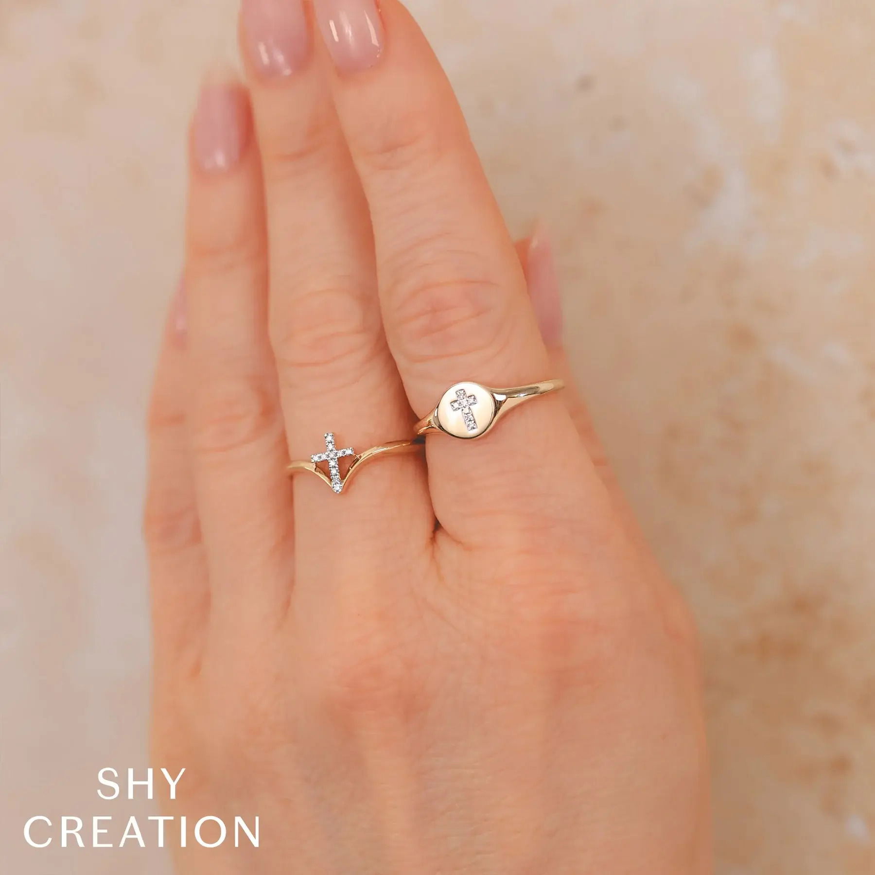 Effortlessly beautiful, this ring complements any style and can be worn on any occasion. All Shy Creation diamonds are natural and hand-selected. All stones are unique and hand set. As a result, you can expect slight variations in the shade, hue, tint of the color stones and stone count.-14k Yellow gold-Round diamonds, 0.02cts-Dimensions, 0.30"W-Size 7Item# 804-2000167 Diamond Cross Signet Ring