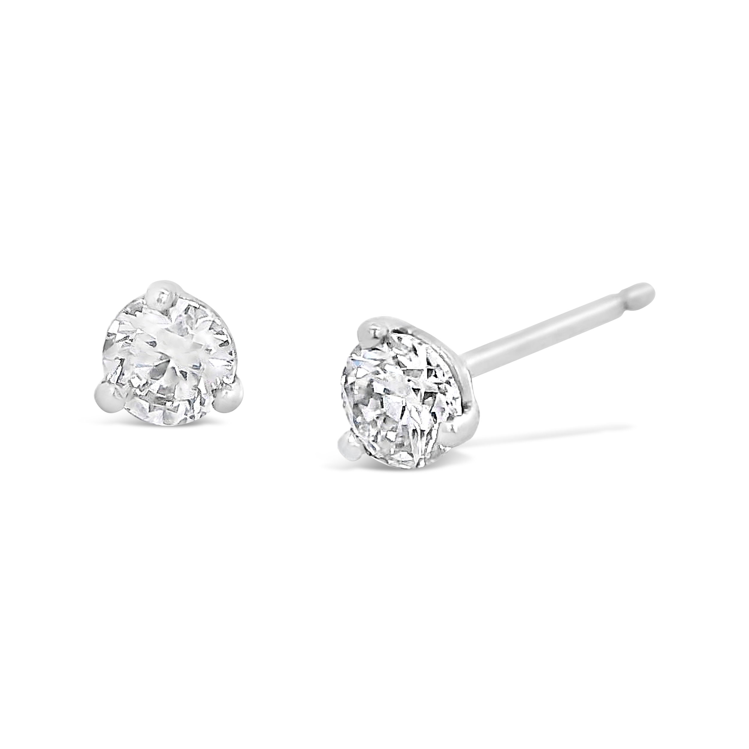 These 14k white gold martini stud earrings showcase diamonds in a sleek, low-profile setting that lets the sparkle take center stage. A refined essential, perfect for daily wear or special occasions.-14k White gold-Diamonds, 0.36cts , G/VS2Item# 150-2000042 Martini Stud Earrings