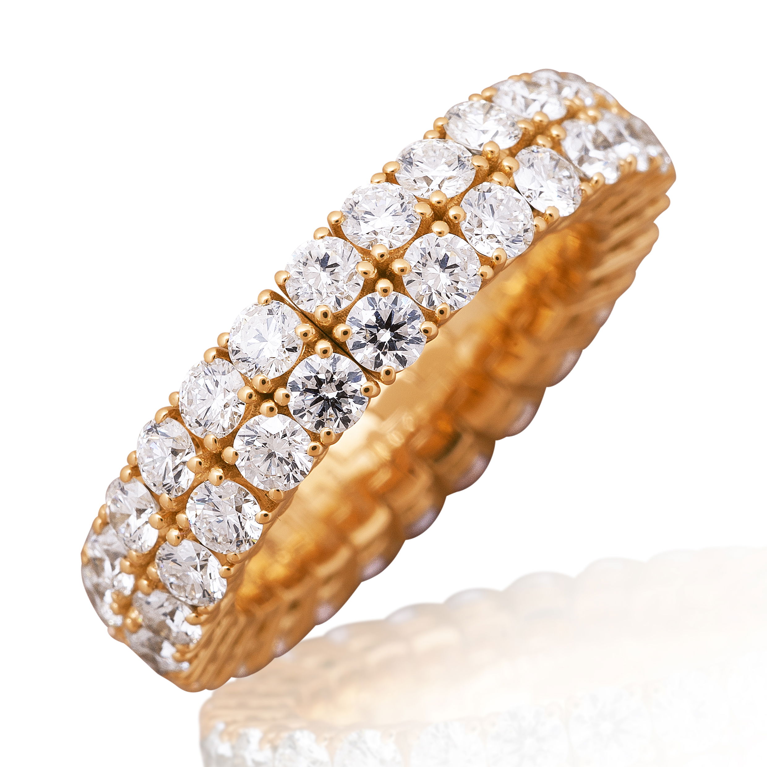 The Xpandable Collection is a revolutionary new line of rings and bracelets that features an innovative technology that solves the problems of tailoring and comfort.-18k Yellow gold-Round diamonds, 3.33cts-Expandable Size, Contact for sizing detailsItem #: 130-2000023 Xpandable Two Row Band