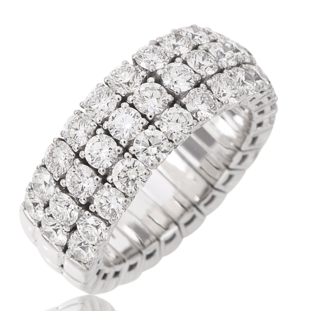 The Xpandable Collection is a revolutionary new line of rings and bracelets that features an innovative technology that solves the problems of tailoring and comfort.-18k White gold-Round diamonds, 2.79cts-Expandable Size, Contact for sizing optionsItem #: 130-2000024 Xpandable Three Row Band