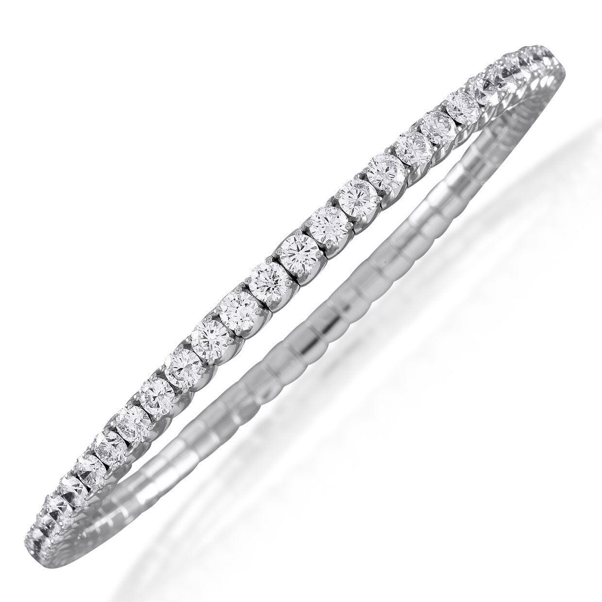 The Xpandable Collection is a revolutionary new line of rings and bracelets that features an innovative technology that solves the problems of tailoring and comfort.-18k White gold-Round diamonds, 7.04cts-Expandable Size, Contact for sizing optionsItem #: 170-2000020 Xpandable Bangle