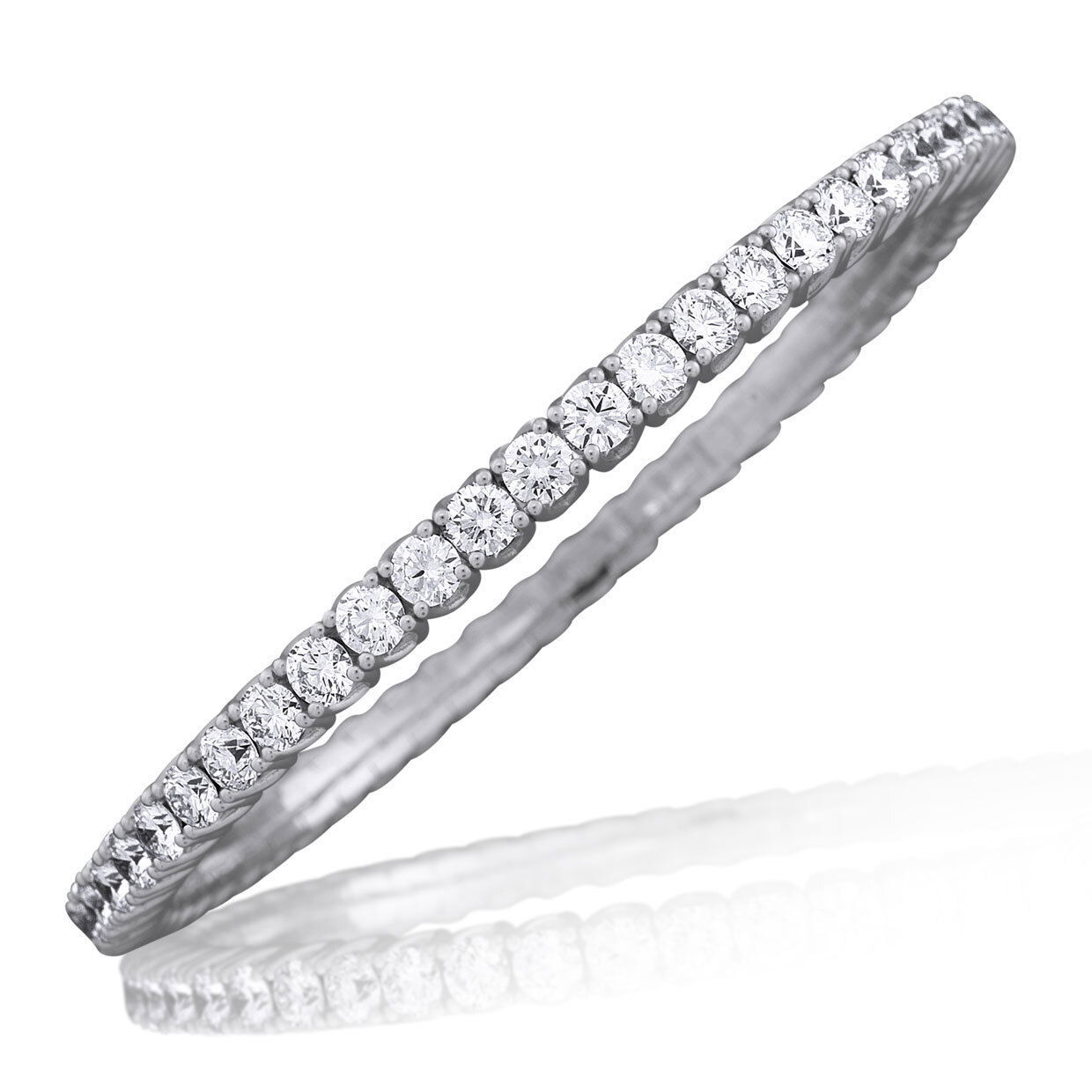 The Xpandable Collection is a revolutionary new line of rings and bracelets that features an innovative technology that solves the problems of tailoring and comfort.-18k White gold-Round diamonds, 8.248cts-Expandable Size, Contact for sizing optionsItem #: 170-2000021 Xpandable Bangle