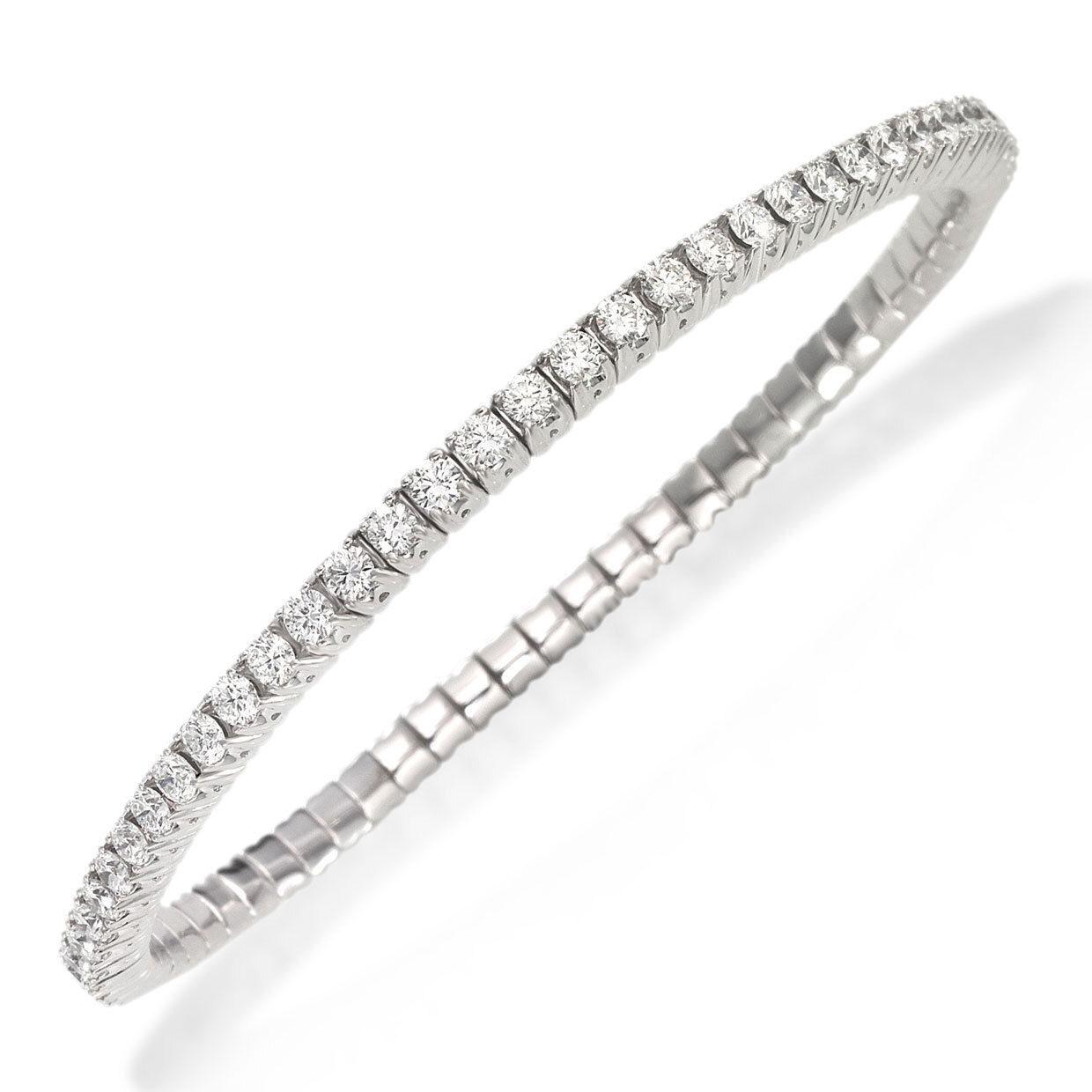 The XPANDABLE ™ Collection is a revolutionary new line of rings and bracelets that features an innovative technology that solves the problems of tailoring and comfort.-18k White gold-Round diamonds, 3.72cts-Expandable Size, Contact for sizing optionsItem #: 170-2000023 Xpandable Bangle