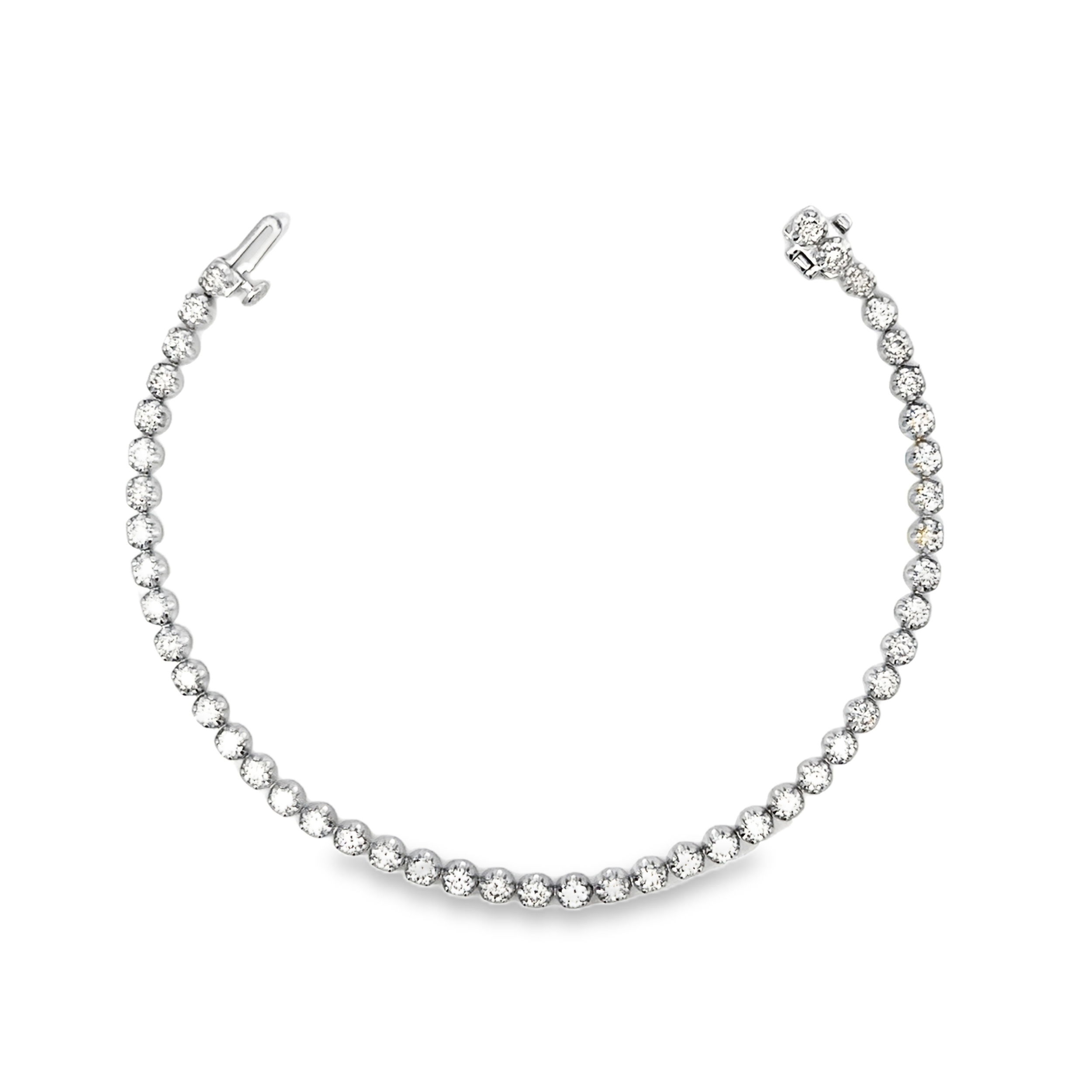 With a modern twist on a classic design, this bracelet is the perfect addition to any style, outfit, and jewelry collection, becoming a beautiful statement piece or a stunning standalone.-14k White gold-Round diamonds, 3.00ctsItem# 808-2000170 Diamond Line Bracelet