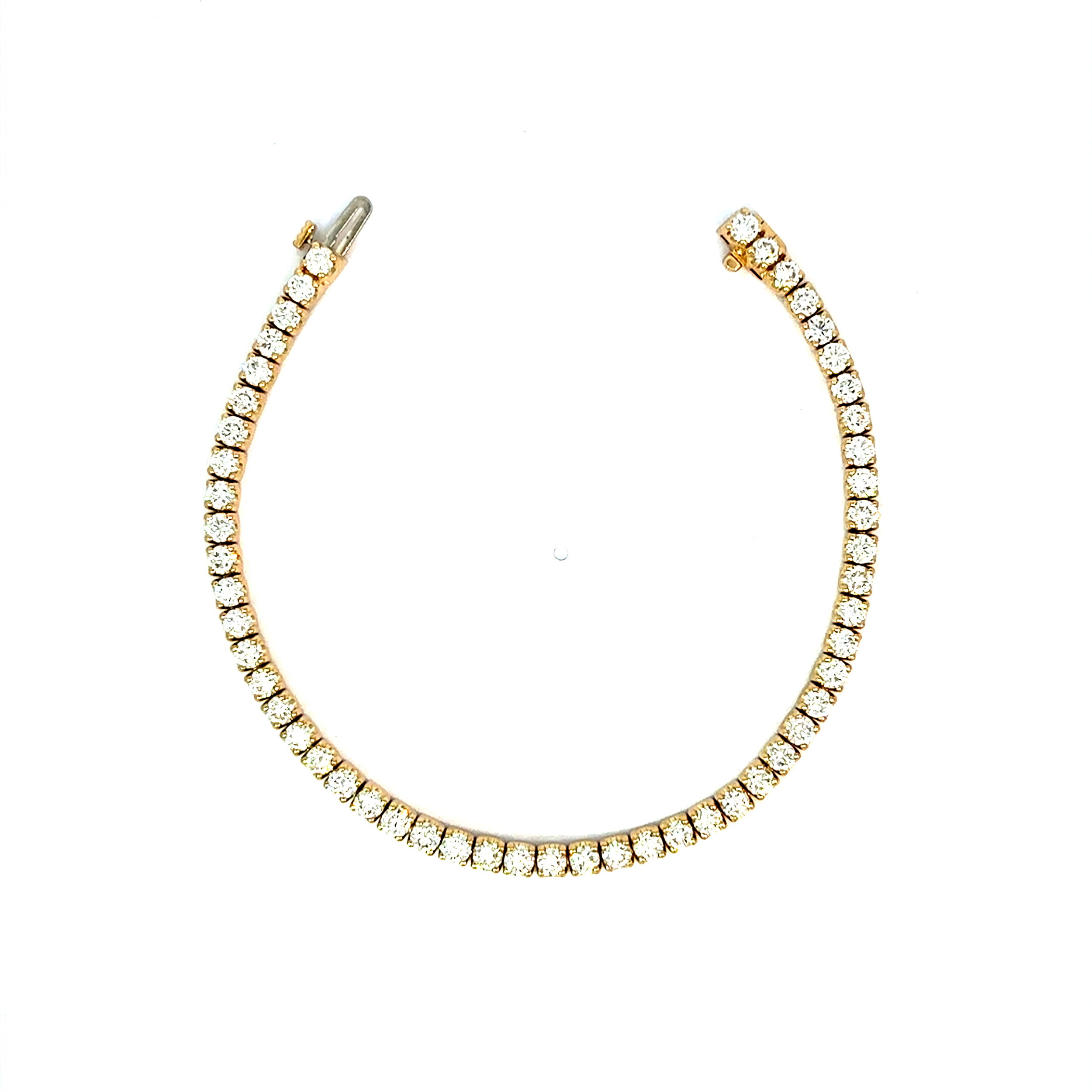 With a modern twist on a classic design, this bracelet is the perfect addition to any style, outfit, or jewelry collection, becoming a beautiful statement piece or a stunning standalone.-14k Yellow gold-Round diamonds, 6ctsItem# 808-2000172 Diamond Line Bracelet