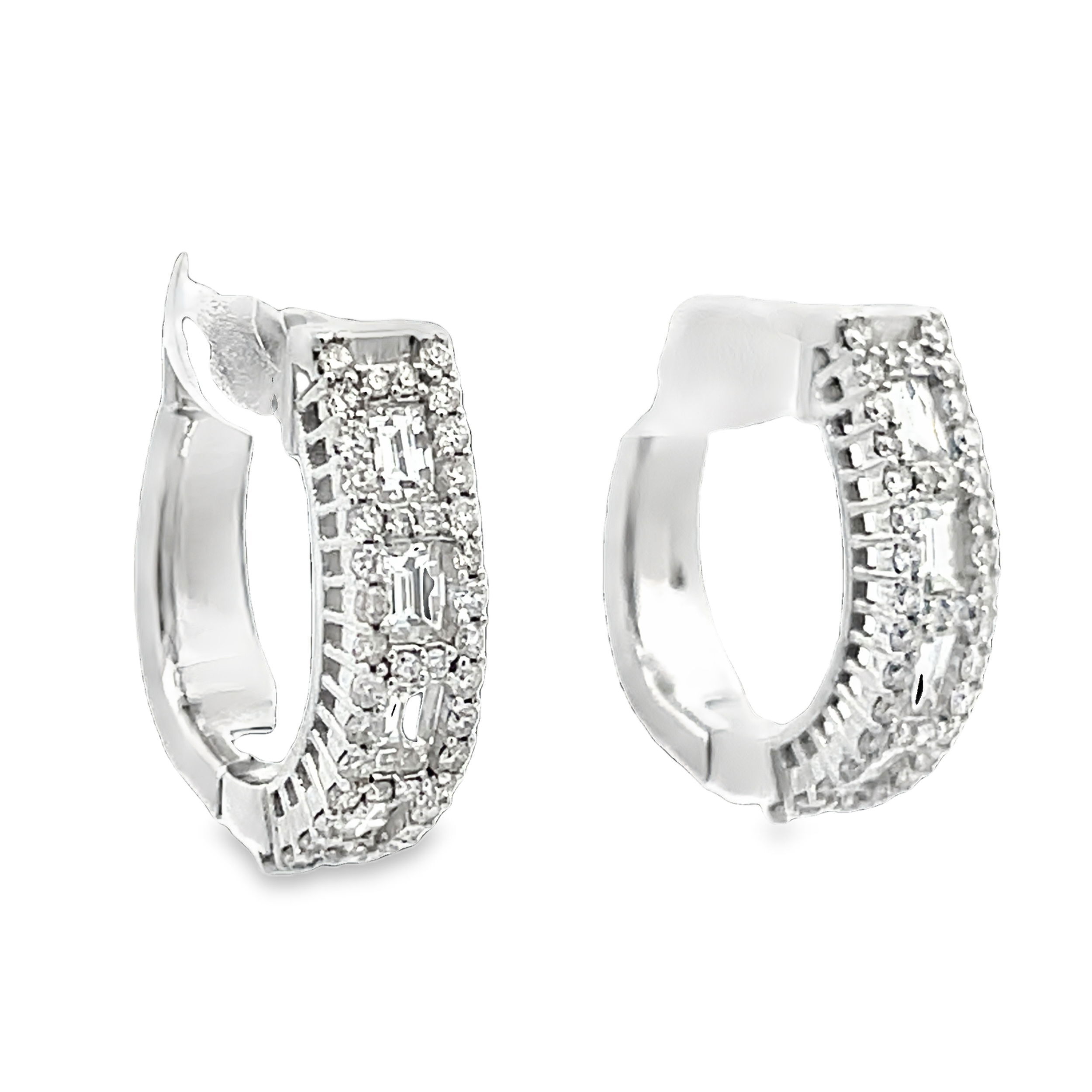 Capturing the beauty of a classic design, these huggies feature both round and baguette cut diamonds creating the perfect earrings to add to ant outfit for any occasion.-14k White gold-Round diamonds, 0.37cts-Baguette diamonds, 0.66ctsItem# 805-2000317 Alternating Diamond Row Huggies