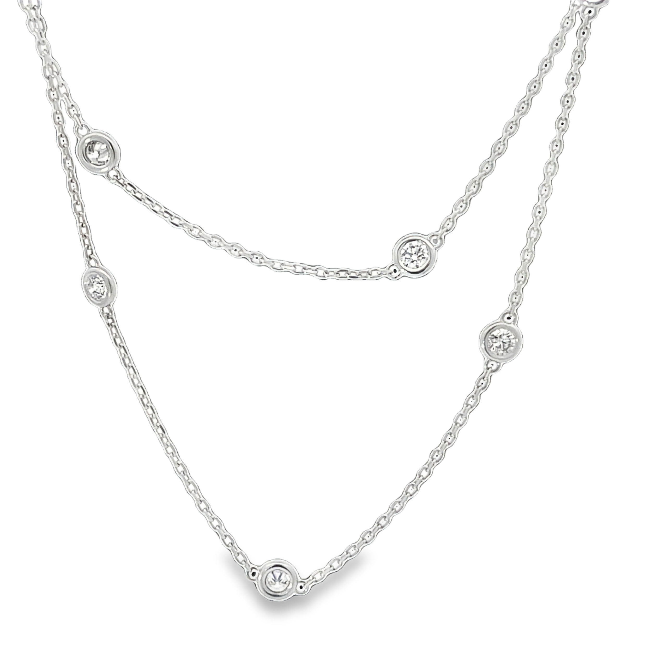 Every woman needs a diamonds by the yard necklace! Great for stand alone wear or stacking with other pieces, this necklace is a timeless addition to any jewelry box.-14k White gold-Round diamonds, 1.49cts-Length 17"Item# 807-2000234 Diamonds by the Yard Necklace