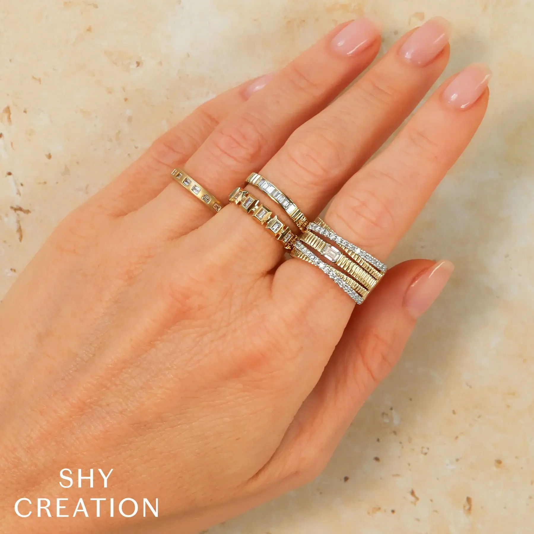 Make a lasting impression with this head-turning design, crafted for those who appreciate bold style. All Shy Creation diamonds are natural and hand-selected. All stones are unique and hand set. As a result, you can expect slight variations in the shade, hue, tint of the color stones and stone count.-14k Yellow gold-Baguette diamonds, 0.17cts-Size 7.25Item# 804-2000183 Diamond Baguette Matte Band