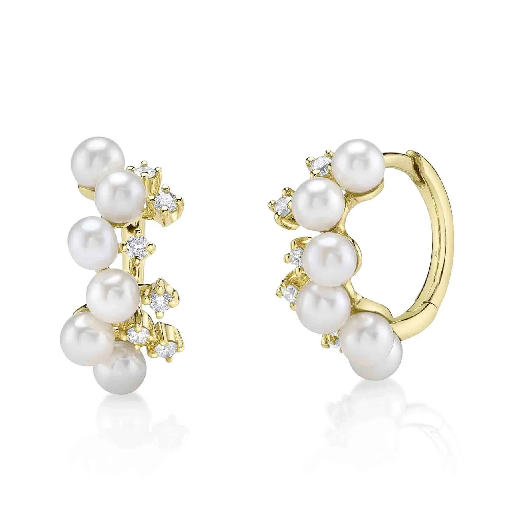 The perfect huggie for a pearl girl! Classy and timeless, these earrings are promised to impress. All Shy Creation diamonds are natural and hand-selected. All stones are unique and hand set. As a result, you can expect slight variations in the shade, hue, tint of the color stones and stone count.-14k Yellow gold-Round diamonds, 0.17cts-Dimensions, 0.60"L / 0.30"WItem# 805-2000327 Diamond & Cultured Pearl Huggie Earrings