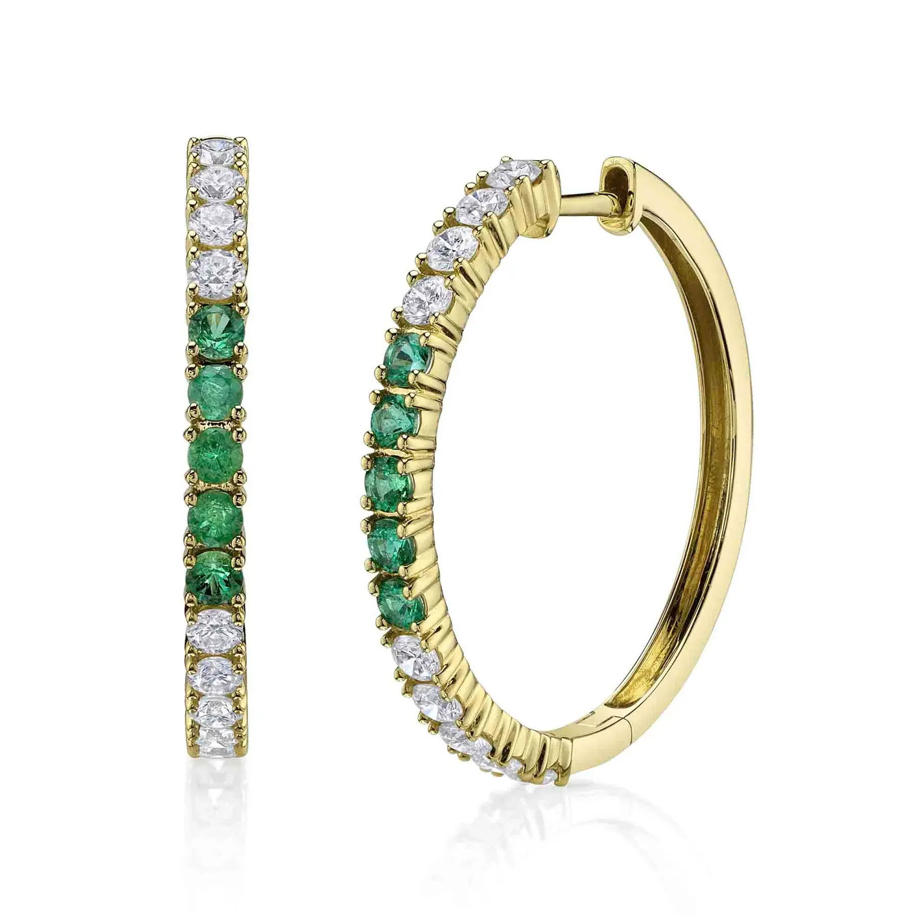 All Shy Creation diamonds are natural and hand-selected. All stones are unique and hand set. As a result, you can expect slight variations in the shade, hue, tint of the color stones and stone count.-14k Yellow gold-Round diamonds, 0.91cts-Round emeralds, 0.50cts-Dimensions, 1.00" diameterItem# 805-2000228 Diamond & Emerald Hoop Earrings