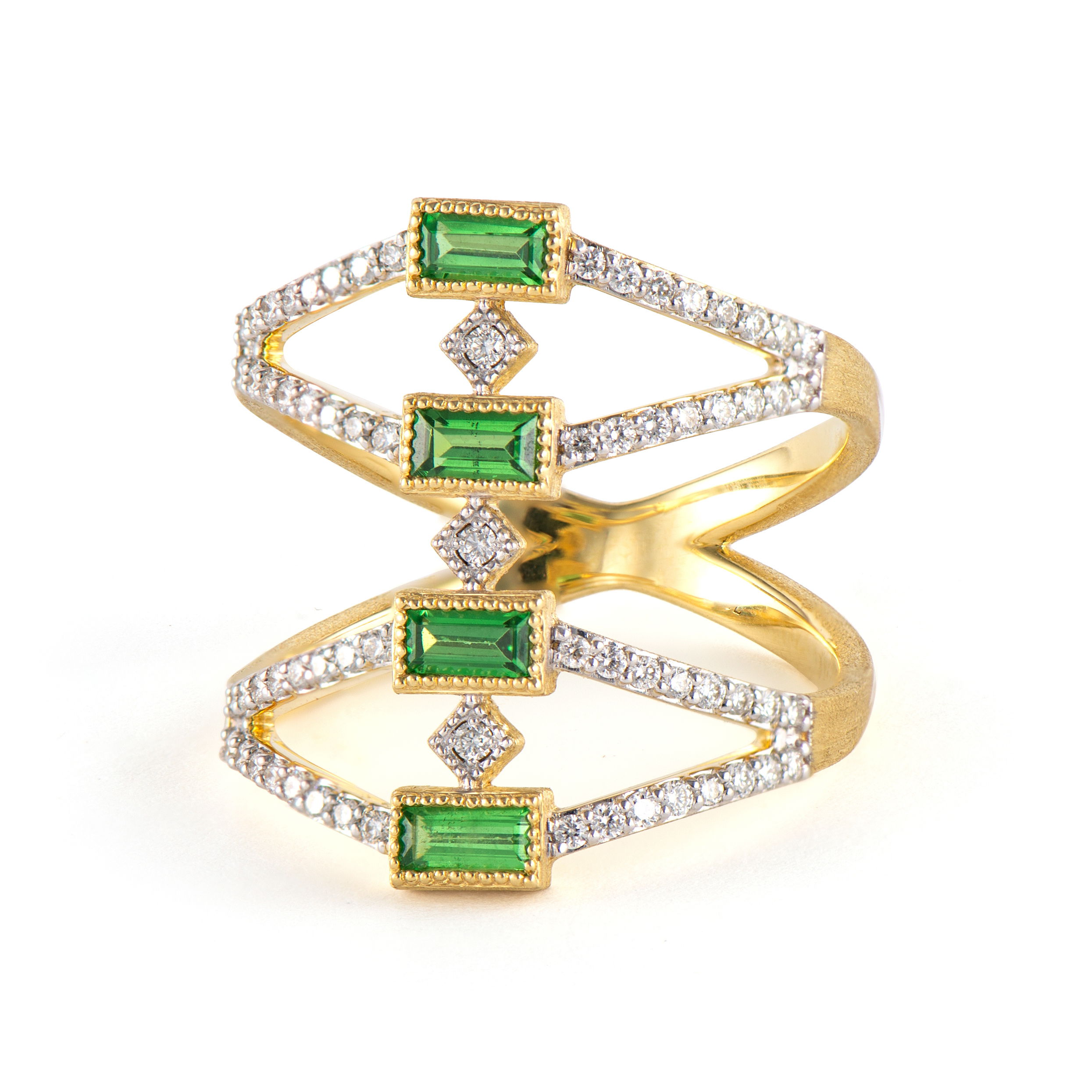 Combining classic elegance with on trend shapes and styles, JFJ offers something for women of all ages. Make a statement with a ring that seamlessly combines classic elegance and modern charm. Perfect for any occasion, this piece adds a touch of sophistication to any style.-18k Yellow gold-Tsavorite-Round white diamonds-Size 7.5Item# 804-2000206 Kite Lisse Ring