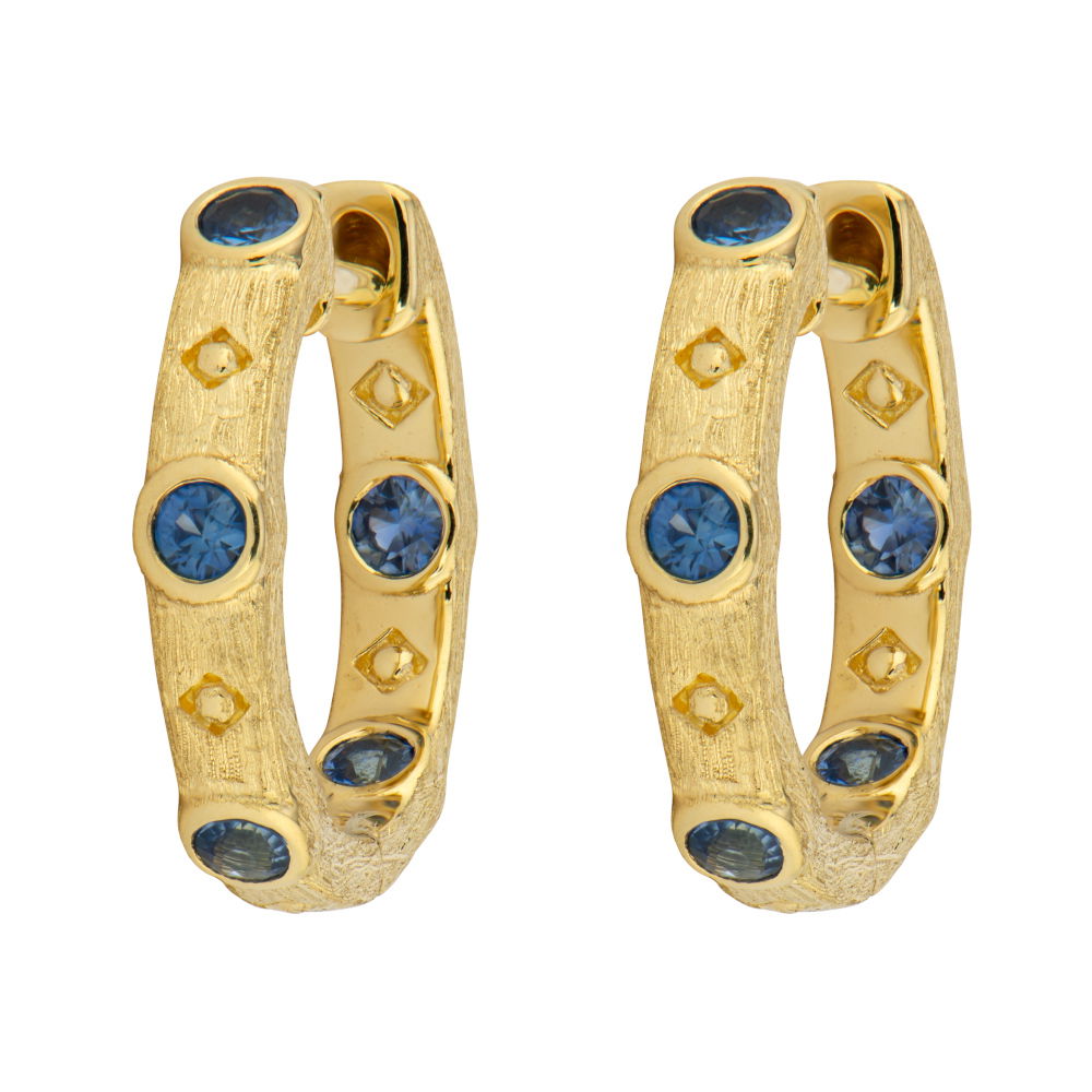 Combining classic elegance with on trend shapes and styles, JFJ offers something for women of all ages. From the Provence Collection, complete your look with huggies that combine sleek design and everyday versatility. These timeless essentials are perfect for layering or wearing on their own.-18k Yellow gold-Round blue sapphires-Dimensions, 14.0mm x 3.0mmItem# 805-2000345 Blue Sapphire Huggies