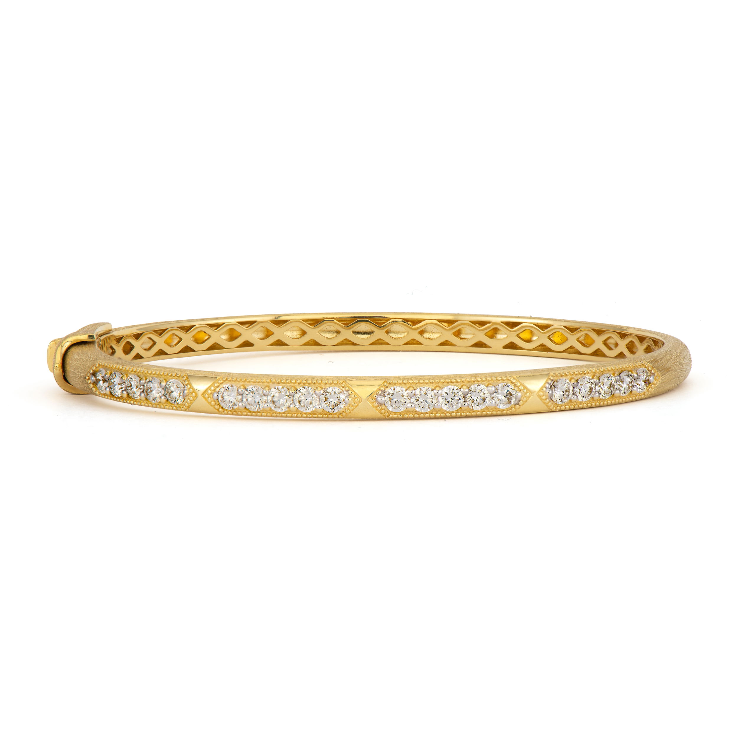 Enhance your collection with a bangle that seamlessly combines classic sophistication and contemporary style. Perfect for stacking or wearing solo, this versatile piece adds a touch of elegance to any outfit.-18k Yellow gold-Round diamonds, 1.22ctsItem# 808-2000197 Diamond Line Bangle