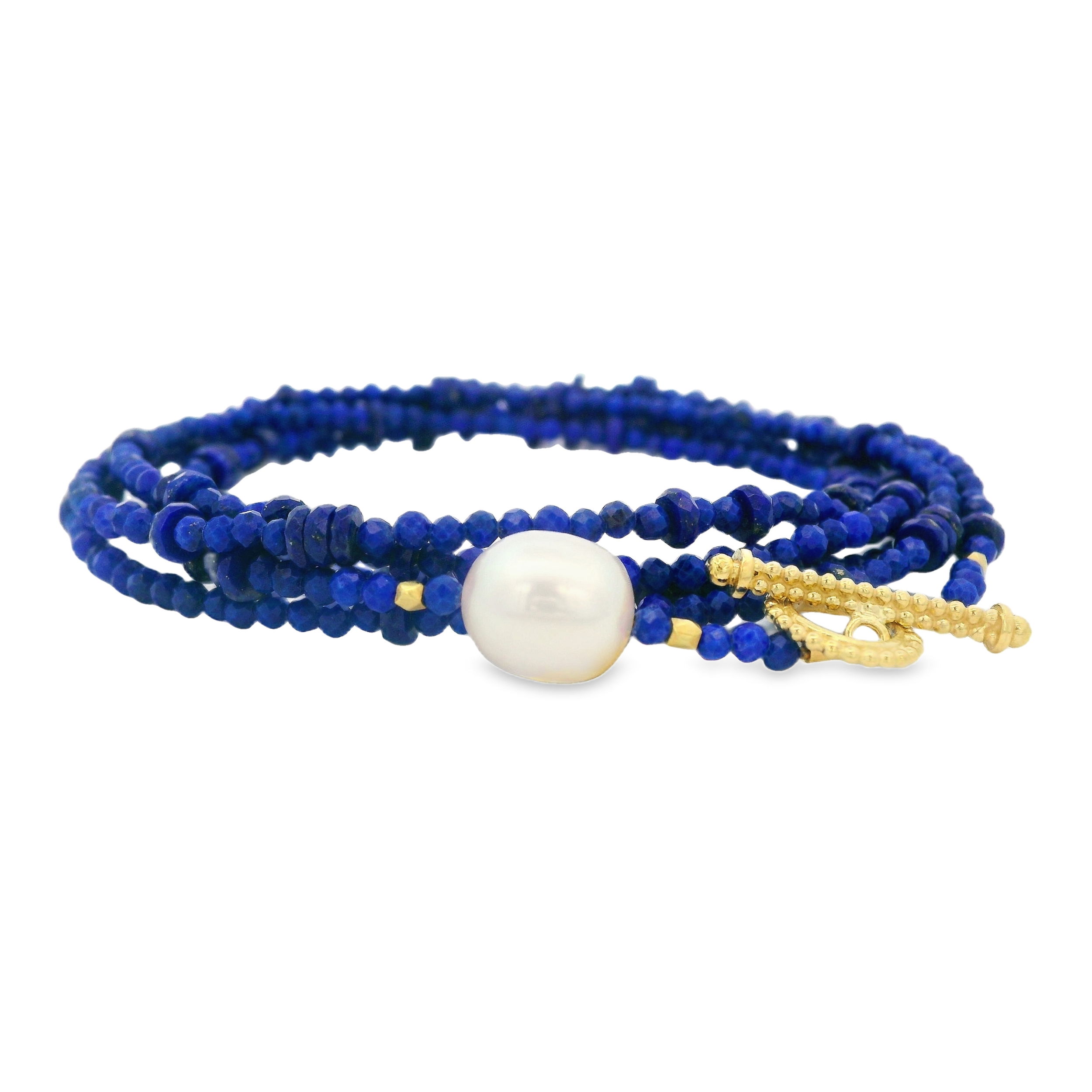 This wrap bracelet combines 18k yellow gold with a beautiful pearl, creating a stunning piece that wraps elegantly around your wrist. This piece can also be worn as a long or layered necklace for a versatile and stylish touch. Pair with a pendant to elevate your style. Available in additional sizes and materials.-18k Yellow gold-Lapis beads-PearlItem# 808-2000207 Lapis and Pearl Convertible Wrap Bracelet