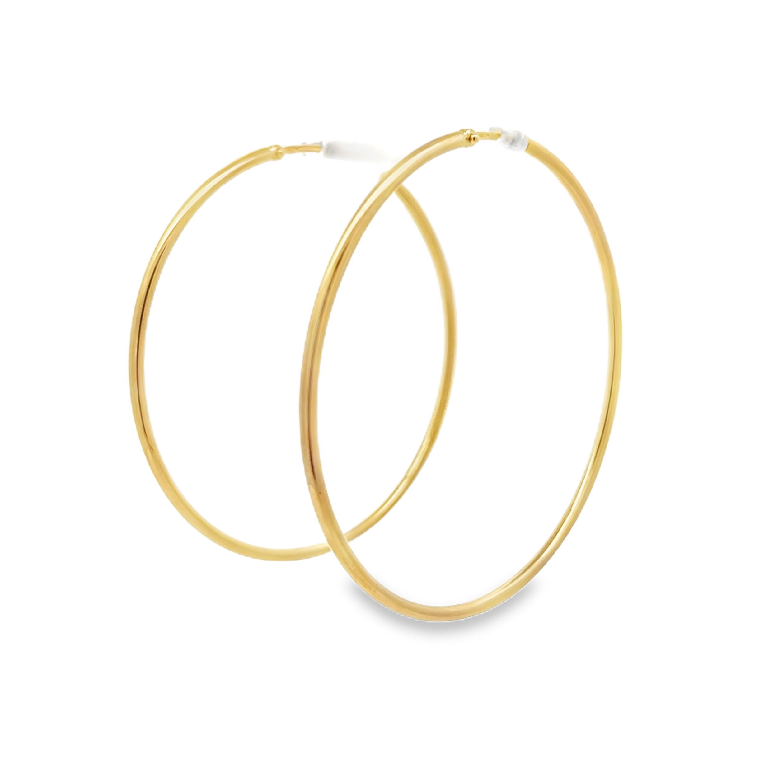 These 18k oval-shaped hoops in polished gold offer a sleek, modern design that seamlessly complements any outfit, perfect for both casual and sophisticated looks.-18k Yellow goldItem# 805-2000361 Large Oval Hoop Earrings