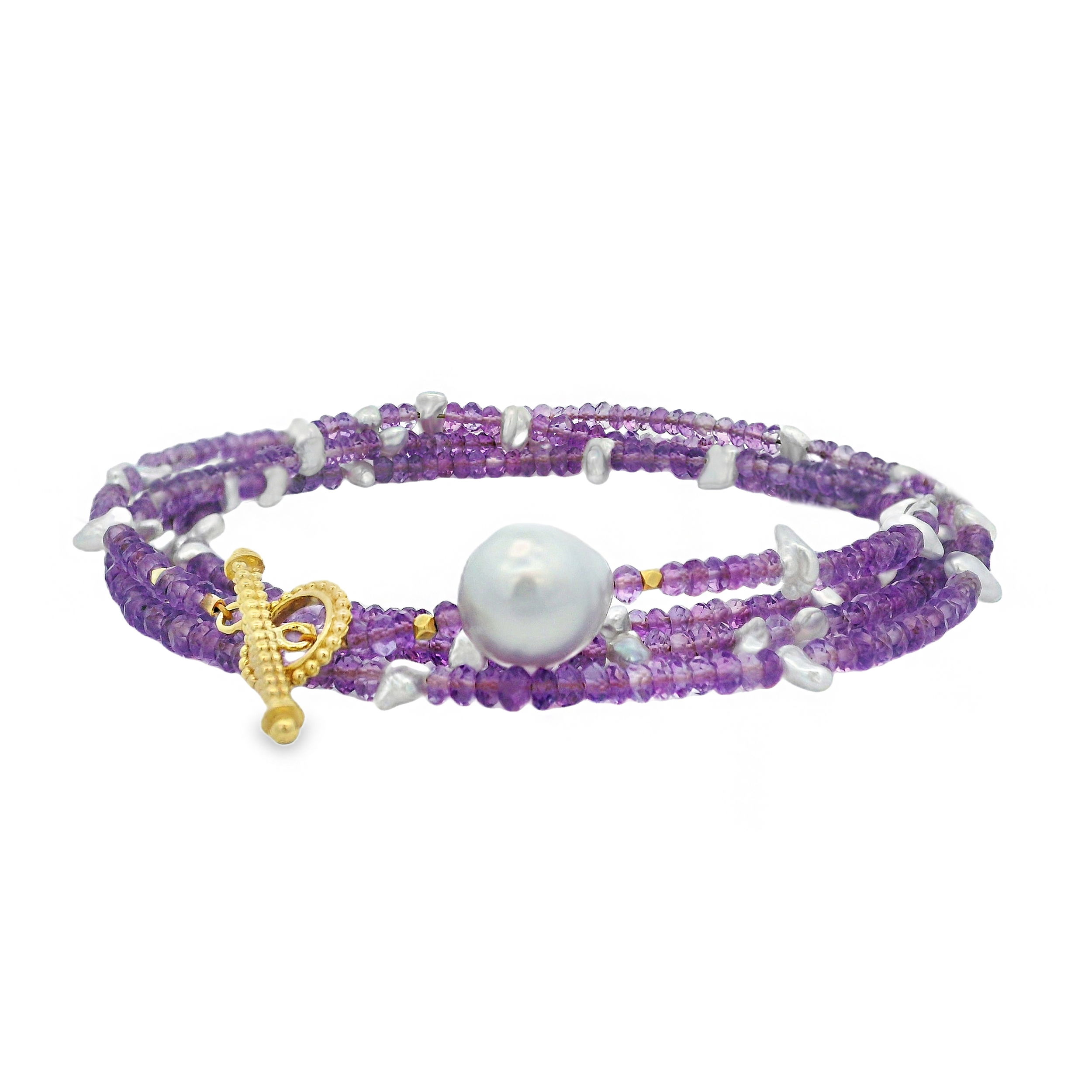 This convertible wrap bracelet features rich amethyst beads, 18k yellow gold, and a luminous keshi pearl for a touch of elegance. Designed for versatility, it can be worn as a bracelet or a necklace, making it a stylish addition to any outfit. Available in additional sizes and materials. Contact us to explore your options.-18k Yellow gold-Amethyst beads-Keshi pearl-Length 34”Item# WRPAMPR34 Convertible Wrap Bracelet | Amethyst