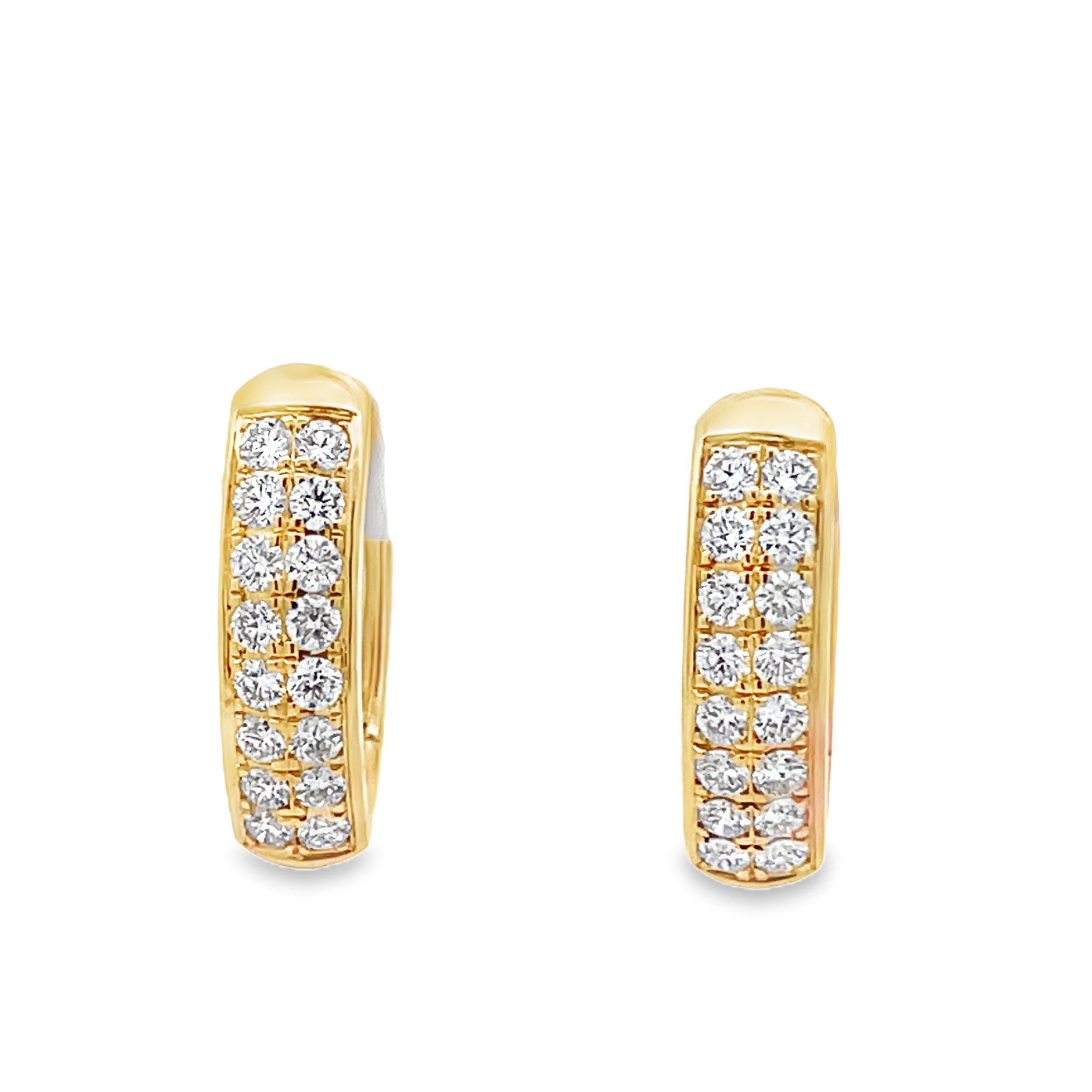 These huggie hoops in 18k gold are accented with two rows of pave-set diamonds, combining understated sparkle with timeless sophistication. Perfect for everyday wear or adding a subtle touch of elegance to your look.-18k Yellow gold-Round diamonds, 1.00ctsItem# 805-2000375 Diamond Encrusted Hoop Earrings