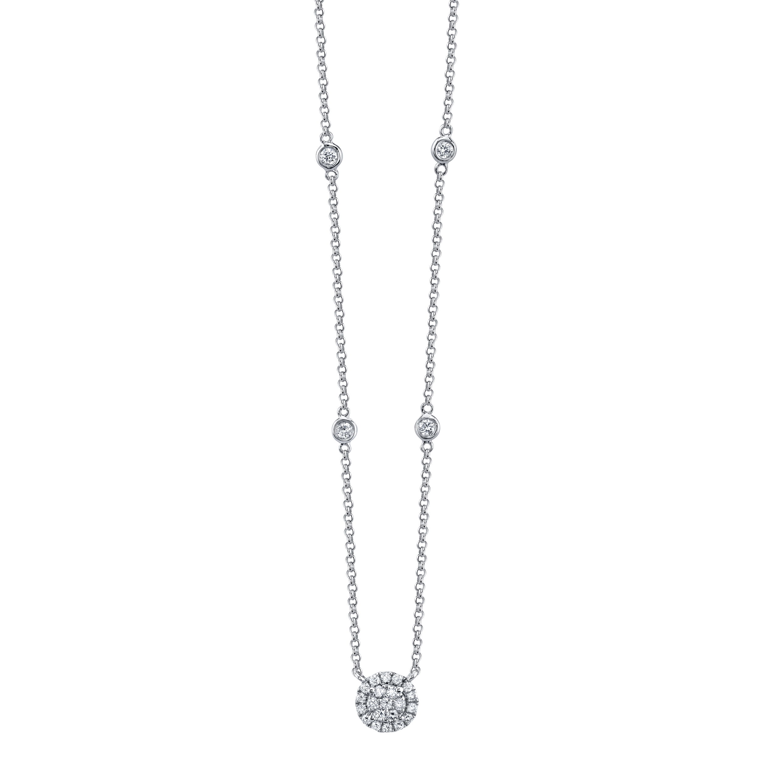 This elegant necklace featuring a diamonds-by-the-yard chain and diamond halo attached pendant is perfect for daily wear or special occasions! -18K White gold-Round diamonds, 0.33cts-Length, 16"-18"Item# 165-2000034 Round Halo Pendant