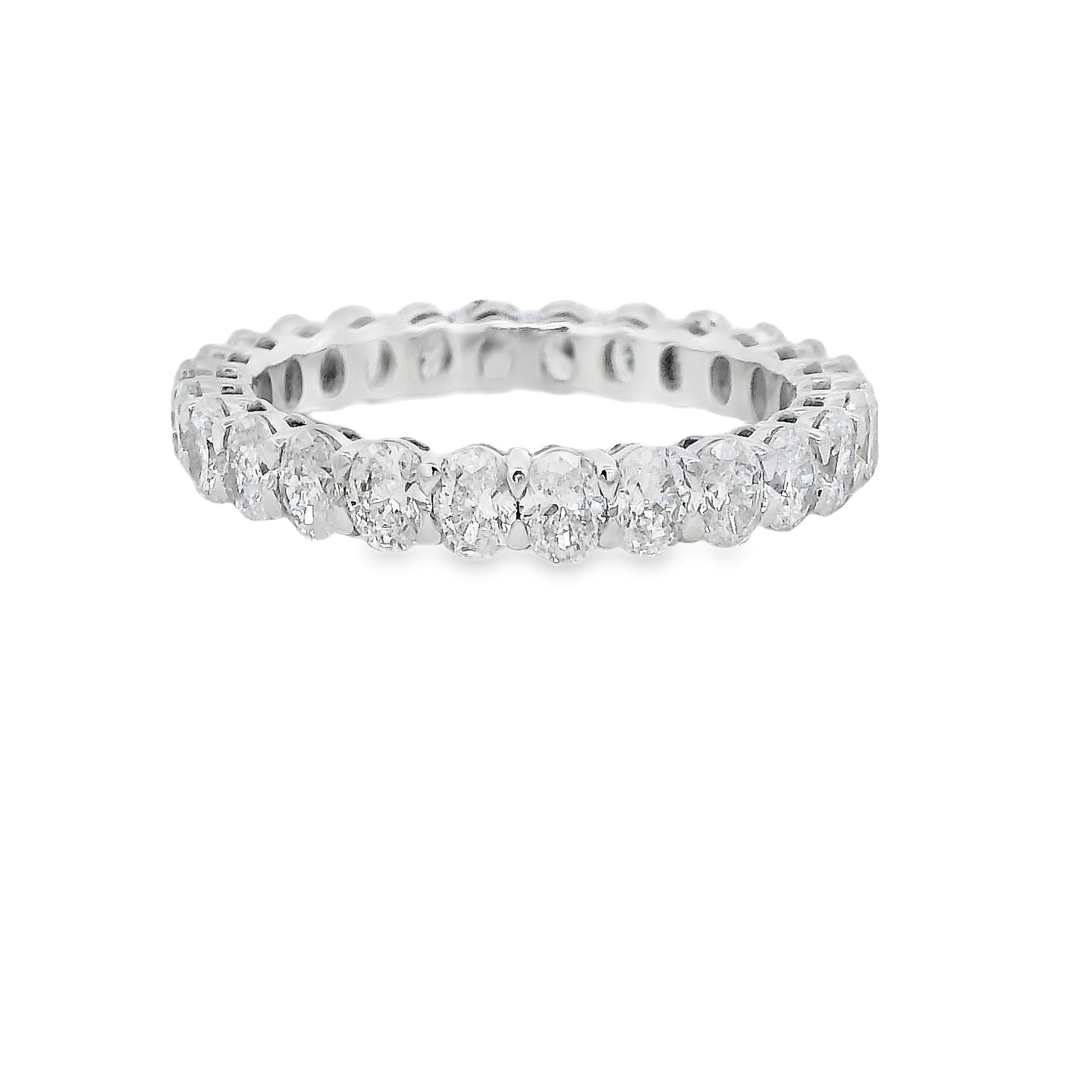 This elegant eternity band showcases a continuous circle of oval diamonds, offering a sleek and sophisticated look. The timeless design ensures the diamonds sparkle from every angle, symbolizing eternal love and commitment. -18k White gold-Oval Diamonds, 2.42cts-Size 6.5, Contact For Sizing OptionsItem# 120-2000021 Oval Eternity Band