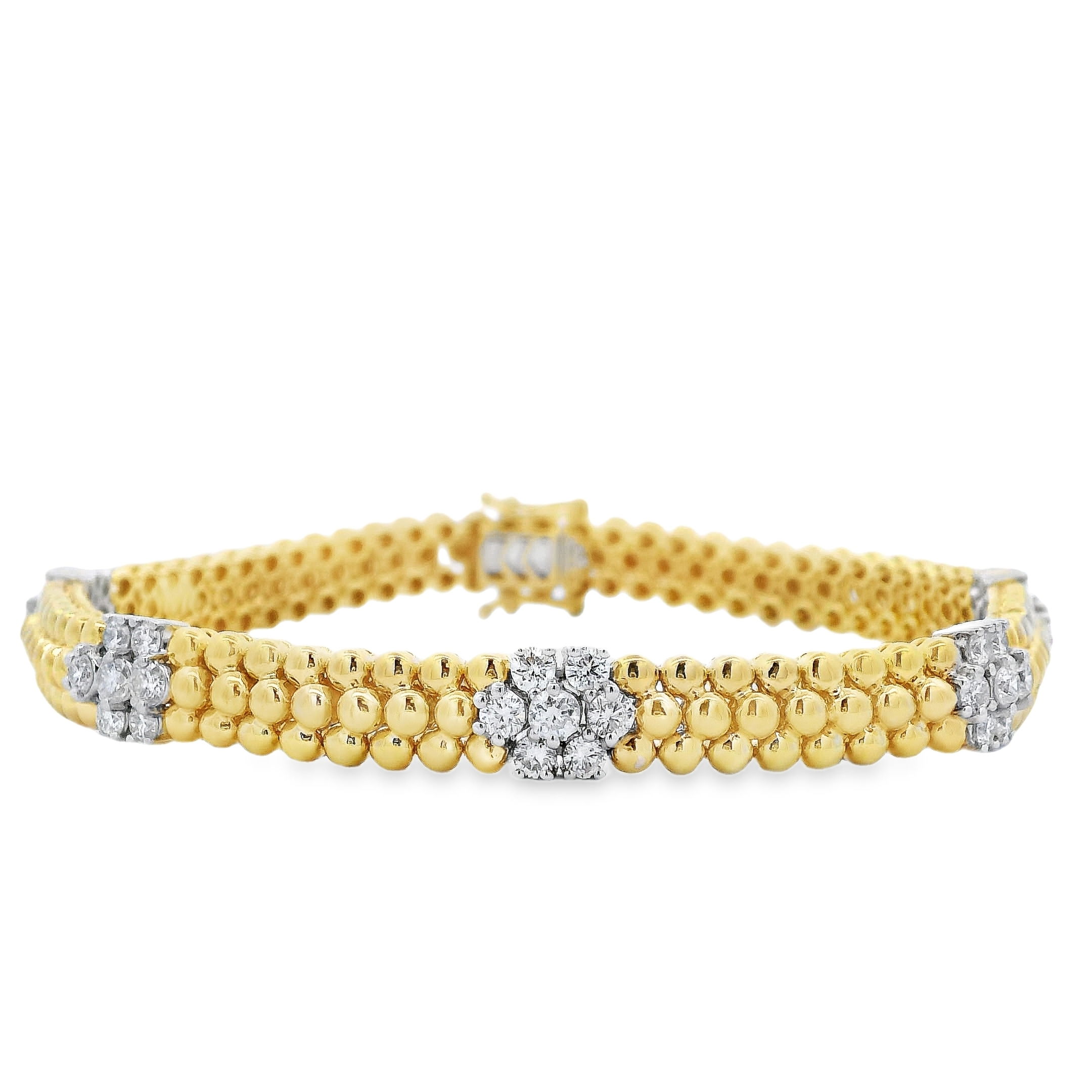 Delicate and timeless, this line bracelet showcases stationary floral diamond clusters, each one blooming with brilliance. A feminine take on a classic style, it adds a romantic sparkle to any look.-14k Two-tone yellow and white gold-Round diamonds, 1.62cts-Contact for sizing optionsItem# 808-2000213 Floral Cluster Diamond Bracelet