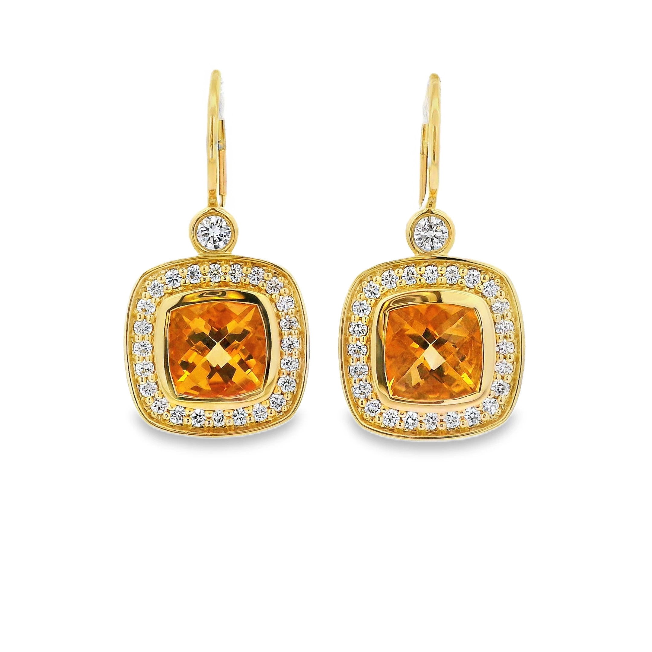 These 18k yellow gold earrings feature warm citrine gemstones accented with sparkling diamonds. Radiant and refined, they add a beautiful pop of color to any ensemble.-18k Yellow gold-Citrine, 3.97cts-Round diamonds, 0.82ctsItem# ND-EAR-00017 Golden Hour Earrings