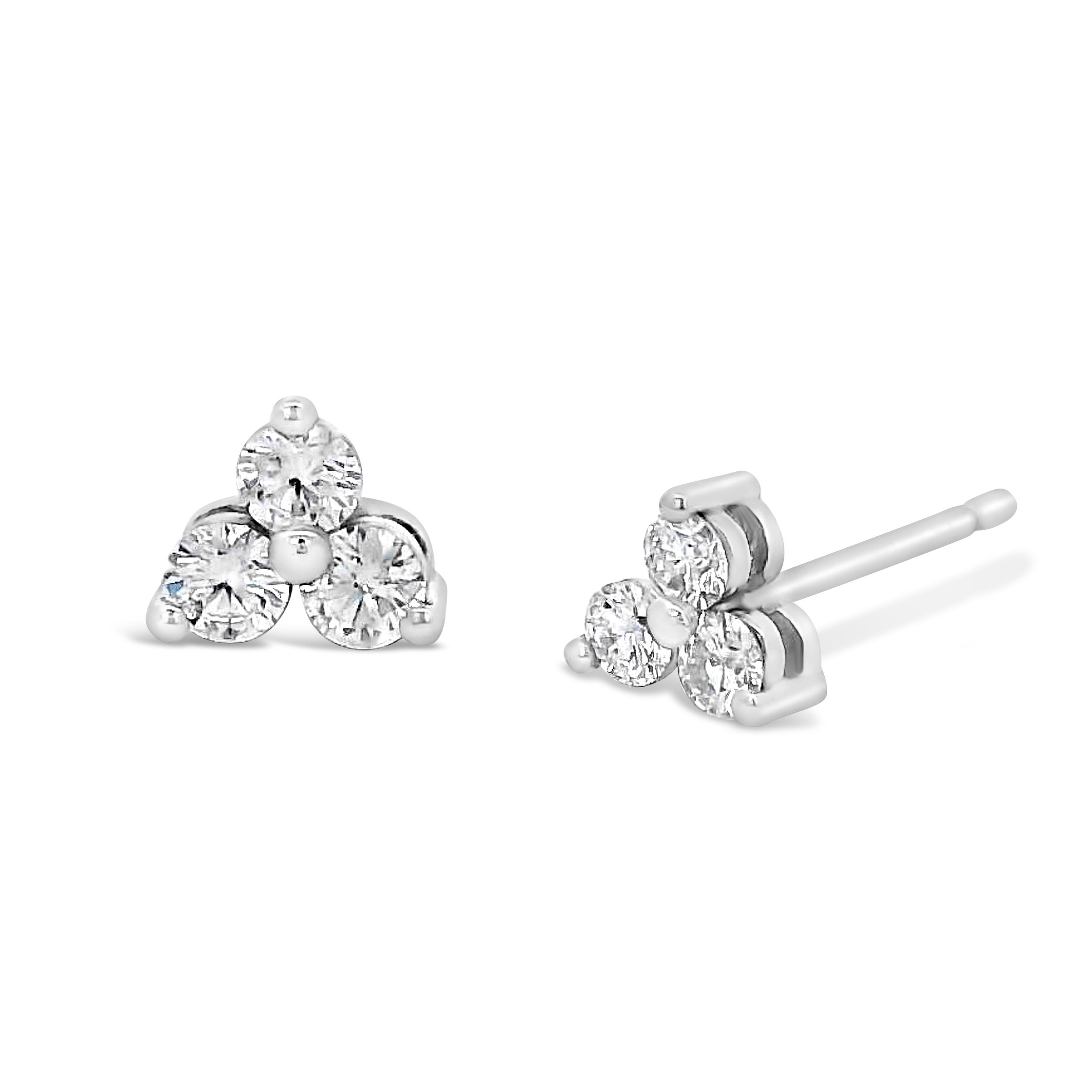 Crafted in 14k white gold, these diamond studs feature a trio of stones for a refined twist on a classic silhouette. Wear them as your everyday sparkle or pair them with other pieces for added brilliance.-14k White gold-Diamonds, 0.20ctsItem# 805-2000390 Three Stone Earring Studs