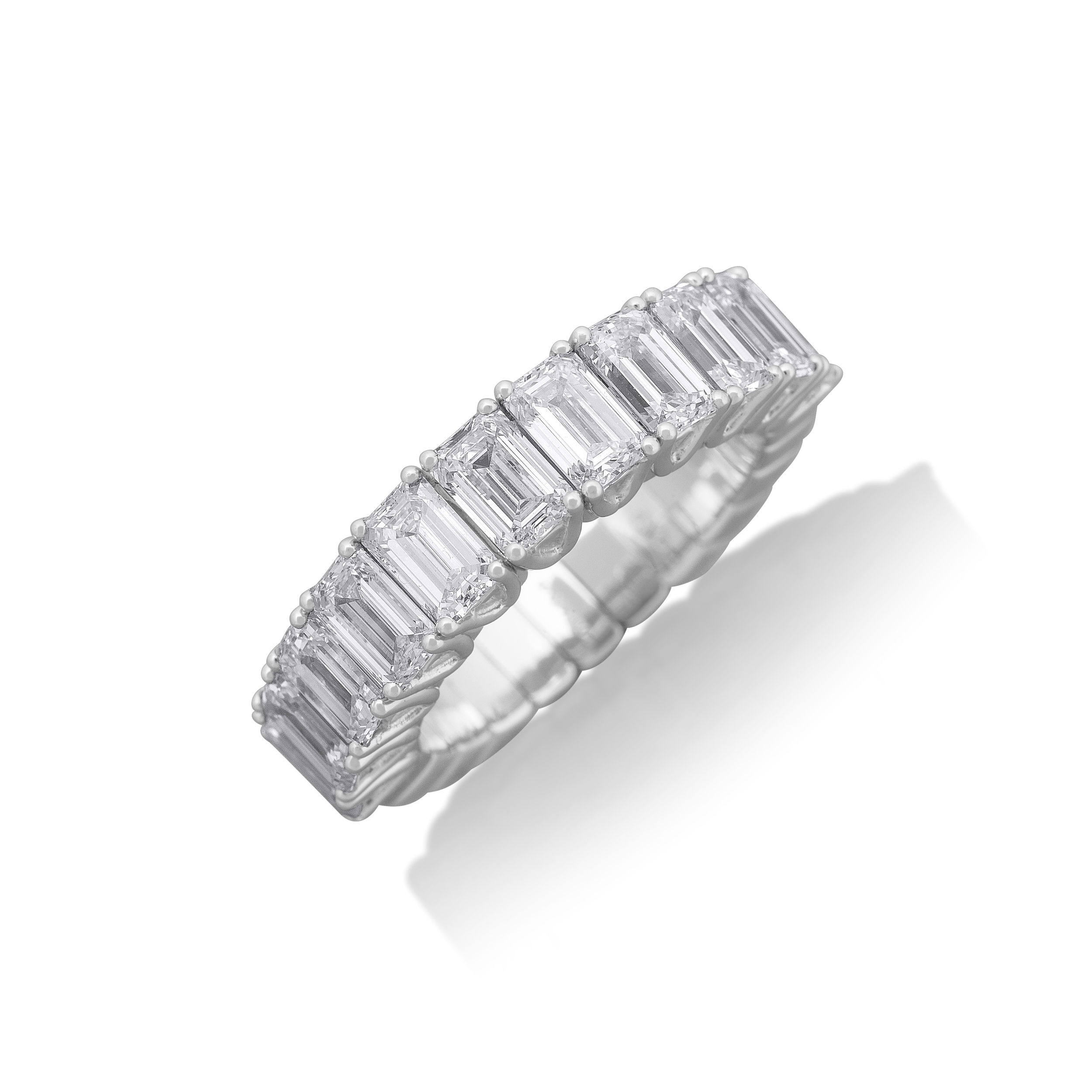 The Xpandable Collection is a revolutionary new line of rings and bracelets that features an innovative technology that solves the problems of tailoring and comfort.-18k White gold-Emerald cut diamonds, 2.68cts-Expandable Size, Contact for sizing optionsItem# 130-2000029 Xpandable Emerald Cut Half Way Band