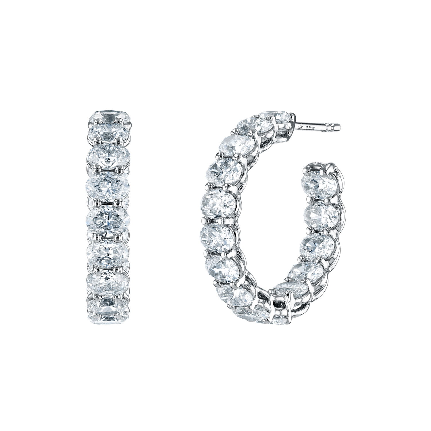 Elegant and eye-catching, these inside-out hoop earrings showcase east-to-west set oval diamonds for a fresh, modern take on a timeless style. The unique orientation ensures maximum sparkle from every angle, making them the perfect blend of sophistication and contemporary design.-18k White gold-Oval diamonds, 5.18ctsItem# 150-2000069 Oval Inside Out Hoops