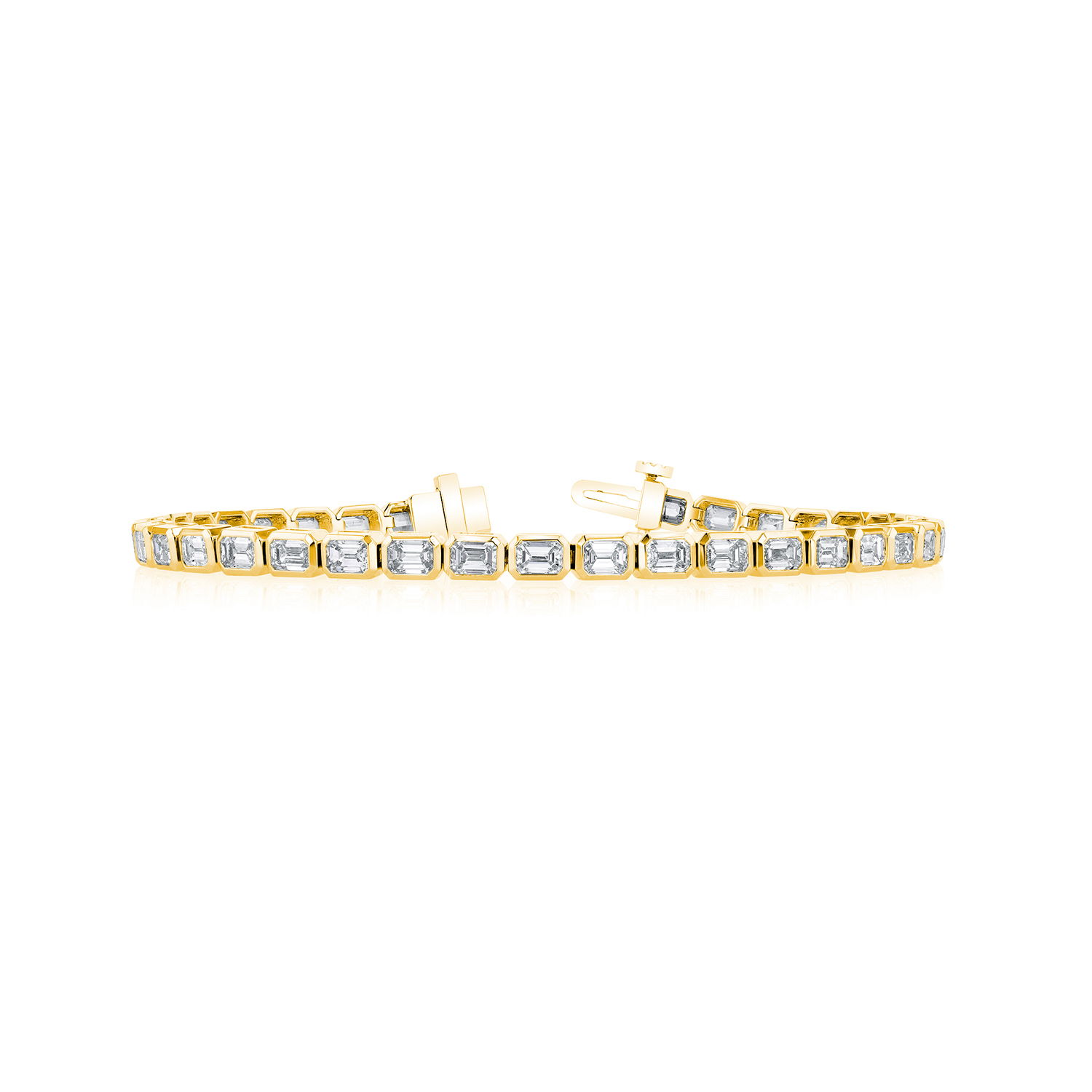 This bezel-set tennis bracelet showcases emerald cut diamonds set east to west for a modern twist on a classic style. Each diamond is framed in sleek metal, offering a clean, contemporary look with timeless elegance. Perfect for layering or wearing solo as a statement piece.-18k Yellow gold-Emerald cut diamonds, 4.38cts-Length 7"Item# 170-2000035 East West Tennis Bracelet