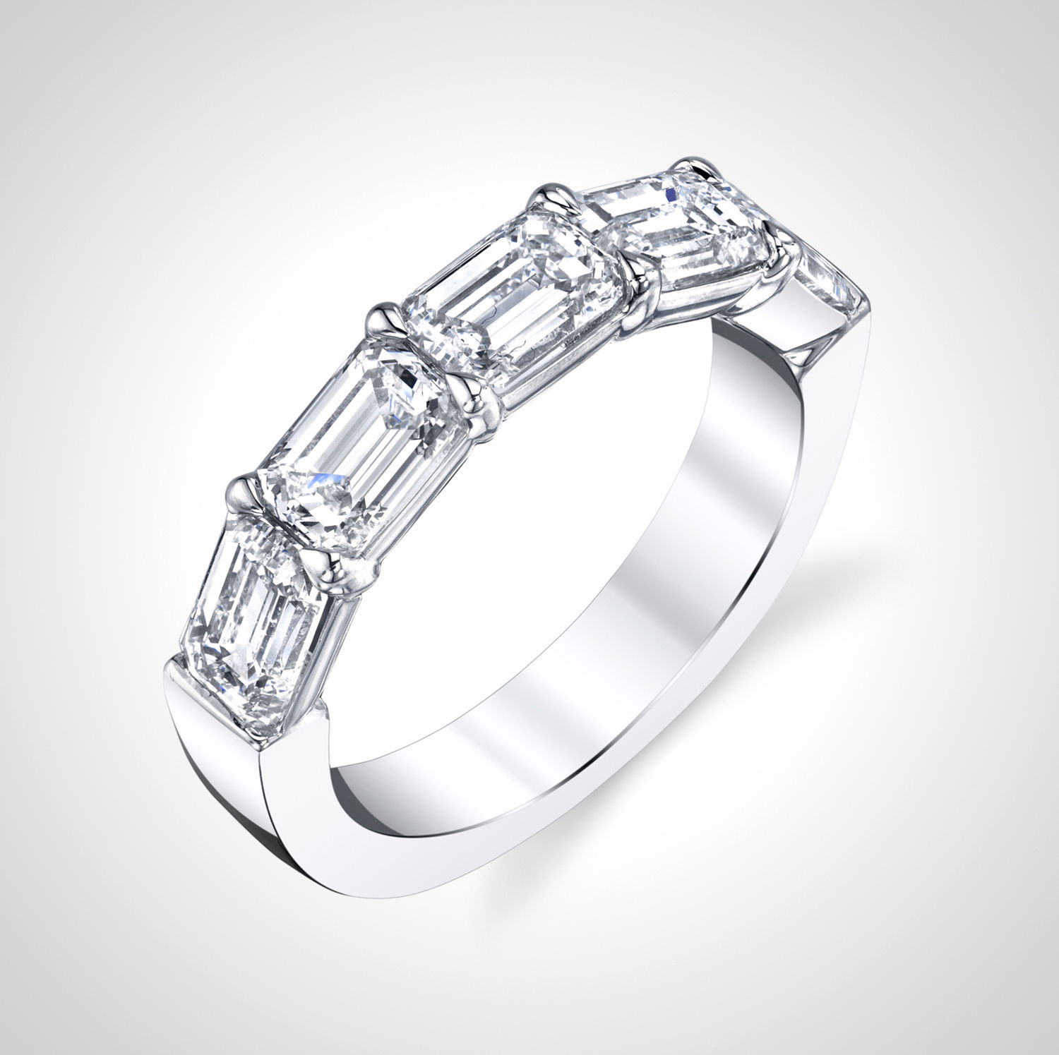 Joshua J. Fine Jewelry is a designer recognized for his innovative and multifaceted jewelry collections. His pieces are an unparalleled blend of brilliance, beauty, and craftsmanship.-18k White gold-Emerald cut diamonds, 2.05cts-Size 6.5, Contact for sizing optionsItem# 110-2000036 Emerald Cut Anniversary Band