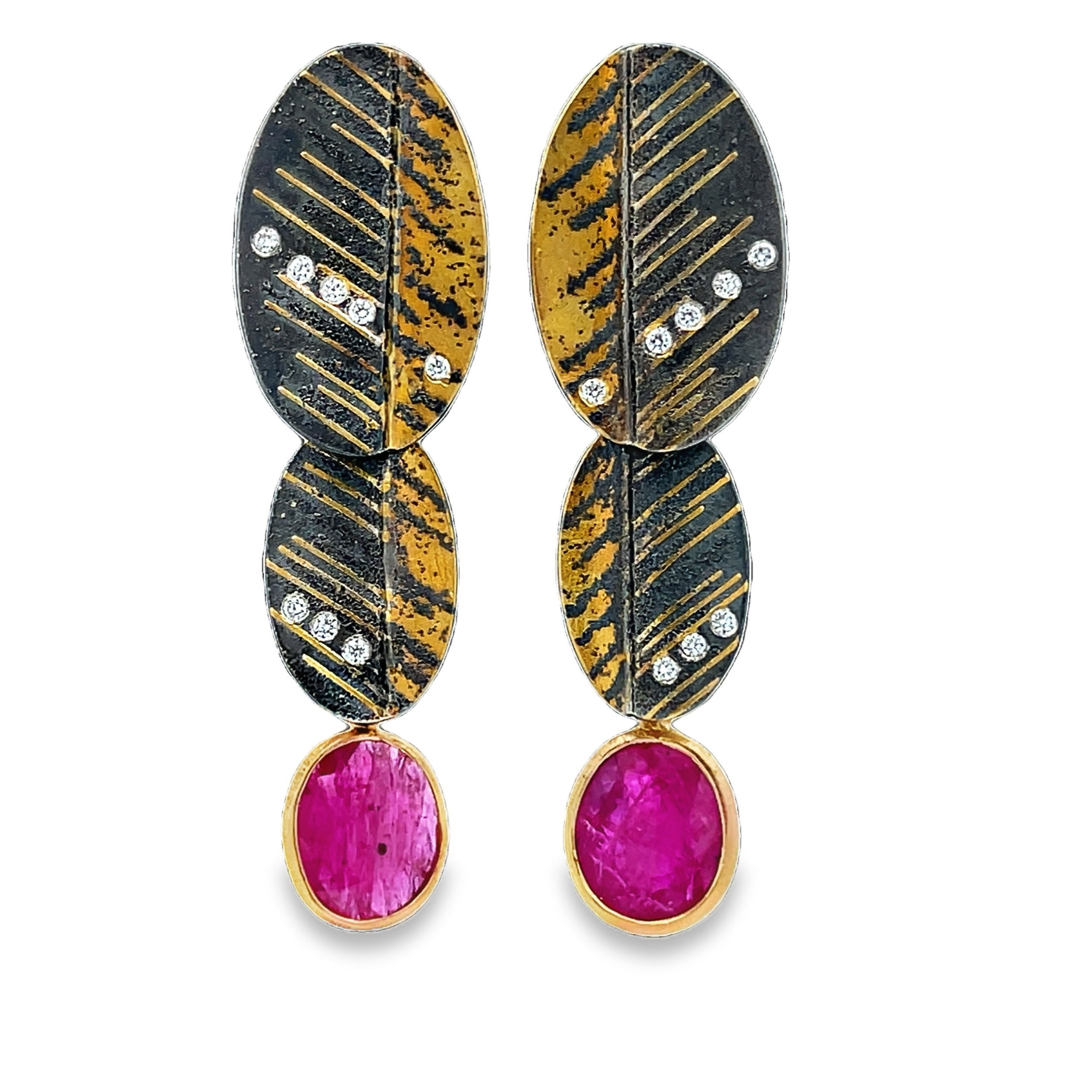 With inspiration rooted in natural structures and growth patterns, Peter Schmid finds his muse within nature and urban environments themselves. Showcasing a unique approach to jewelry design, the world of Atelier Zobel boasts creativity and inspiration within every piece.-24k Yellow gold-Sterling silver-Rubies, 5.43cts-Round diamonds, 0.16ctsItem# 805-2000400 Detachable Ruby Drop Earrings