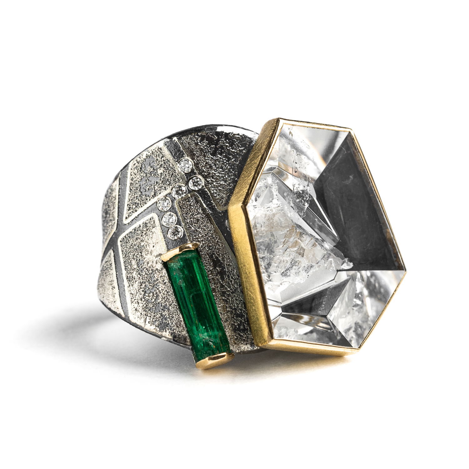 With inspiration rooted in natural structures and growth patterns, Peter Schmid finds his muse within nature and urban environments themselves. Showcasing a unique approach to jewelry design, the world of Atelier Zobel boasts creativity and inspiration within every piece.-24k Yellow gold-Sterling silver-Emerald, 1.25ct-Quartz, 21.58ct-Diamonds, 0.06ctsItem# 804-2000223 Quartz & Emerald Ring