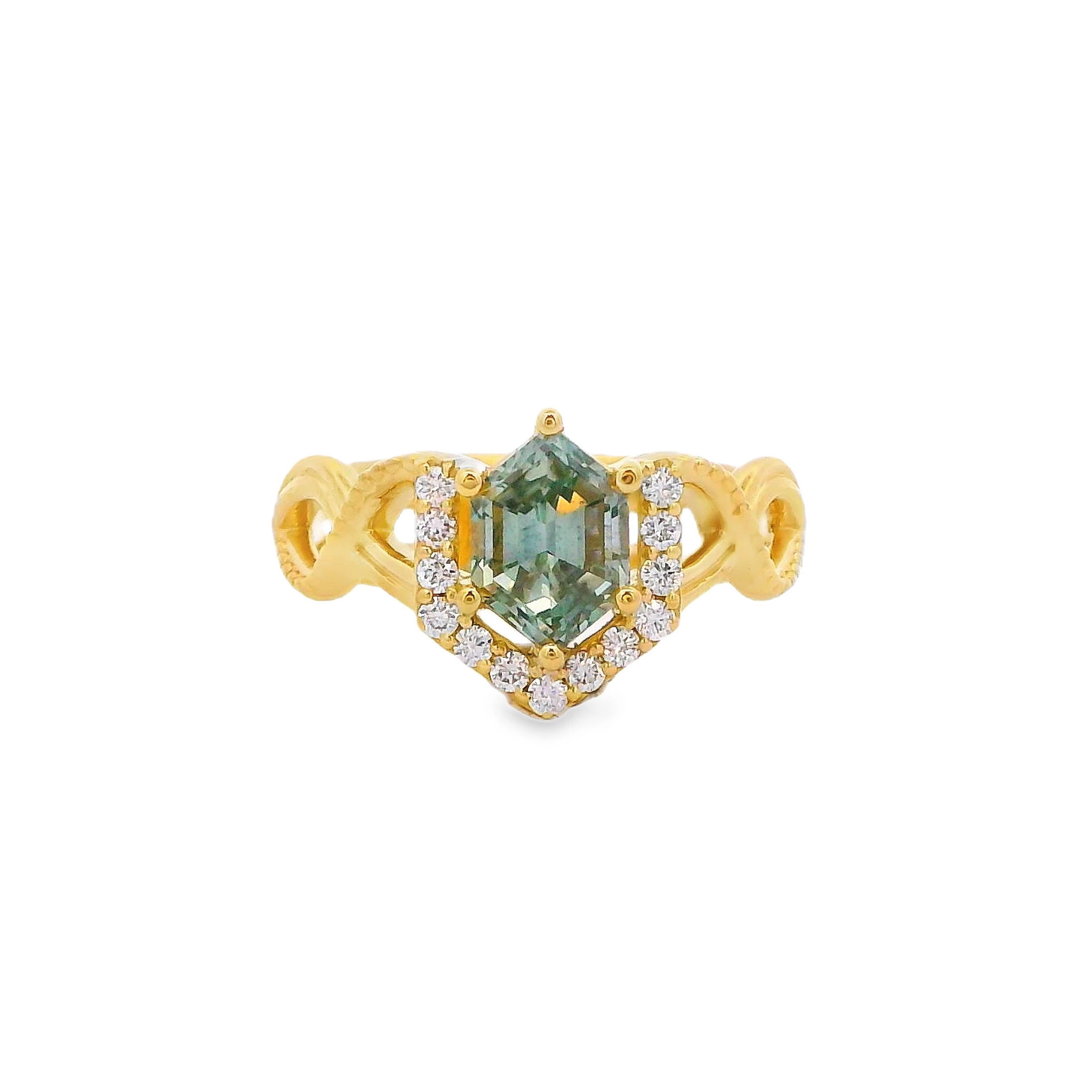 This 18k yellow gold ring showcases a stunning green Madagascar sapphire, accented by brilliant diamonds that add a touch of sparkle. A statement of elegance and natural beauty, it's perfect for any occasion.-18k Yellow gold-Green Madagascar sapphire, 1.45ct-Diamonds, 0.16cts-Size 6Item# ND-Ring-00015 Feyré Ring