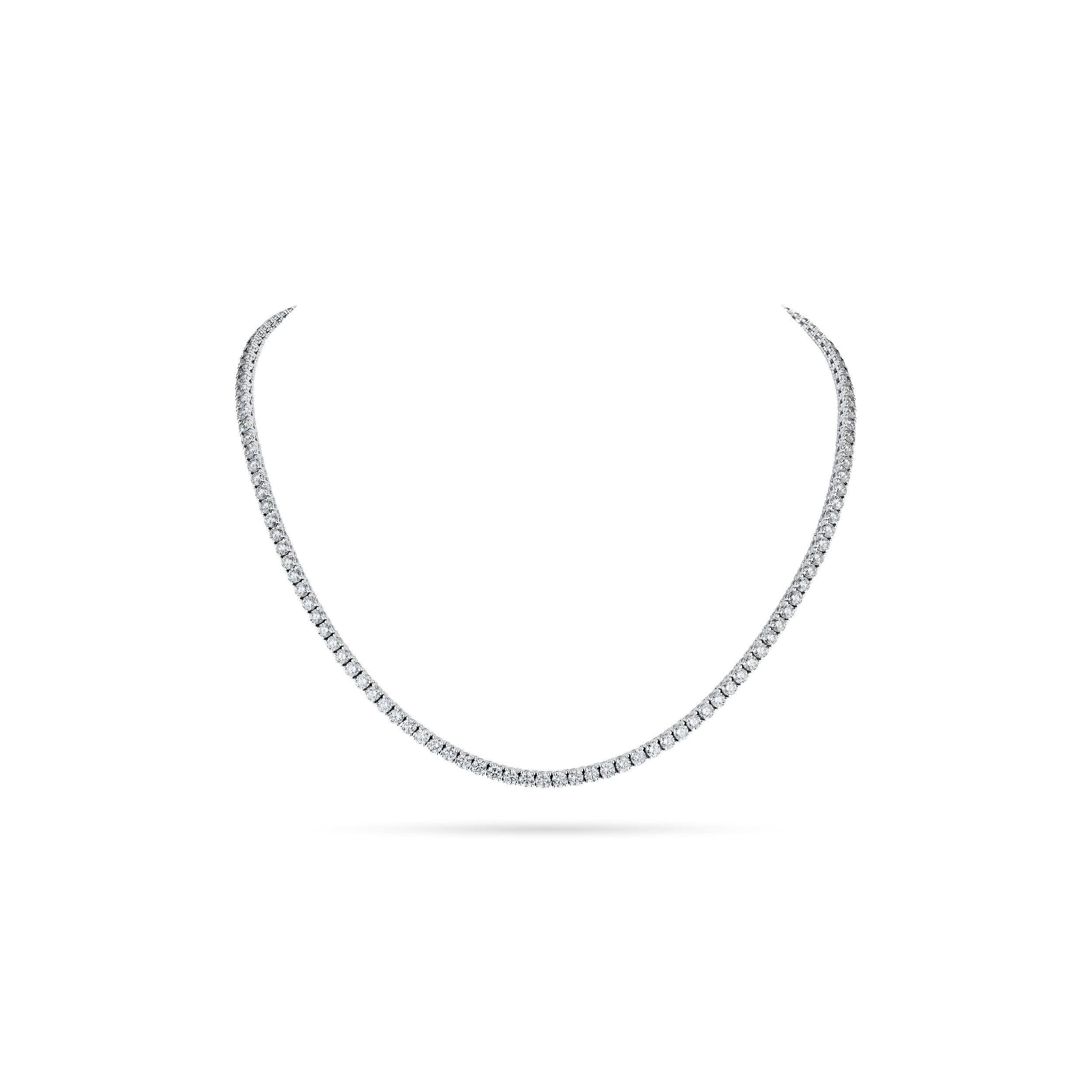 Timeless and refined, this classic line necklace showcases a continuous row of brilliant round diamonds, each meticulously set to maximize sparkle. Perfectly balanced in elegance and simplicity, it’s a versatile piece that transitions effortlessly from everyday sophistication to formal glamour.-18k White gold-Round diamonds, 6.41cts-Length, 16"Item# 165-2000041 Diamond Line Necklace