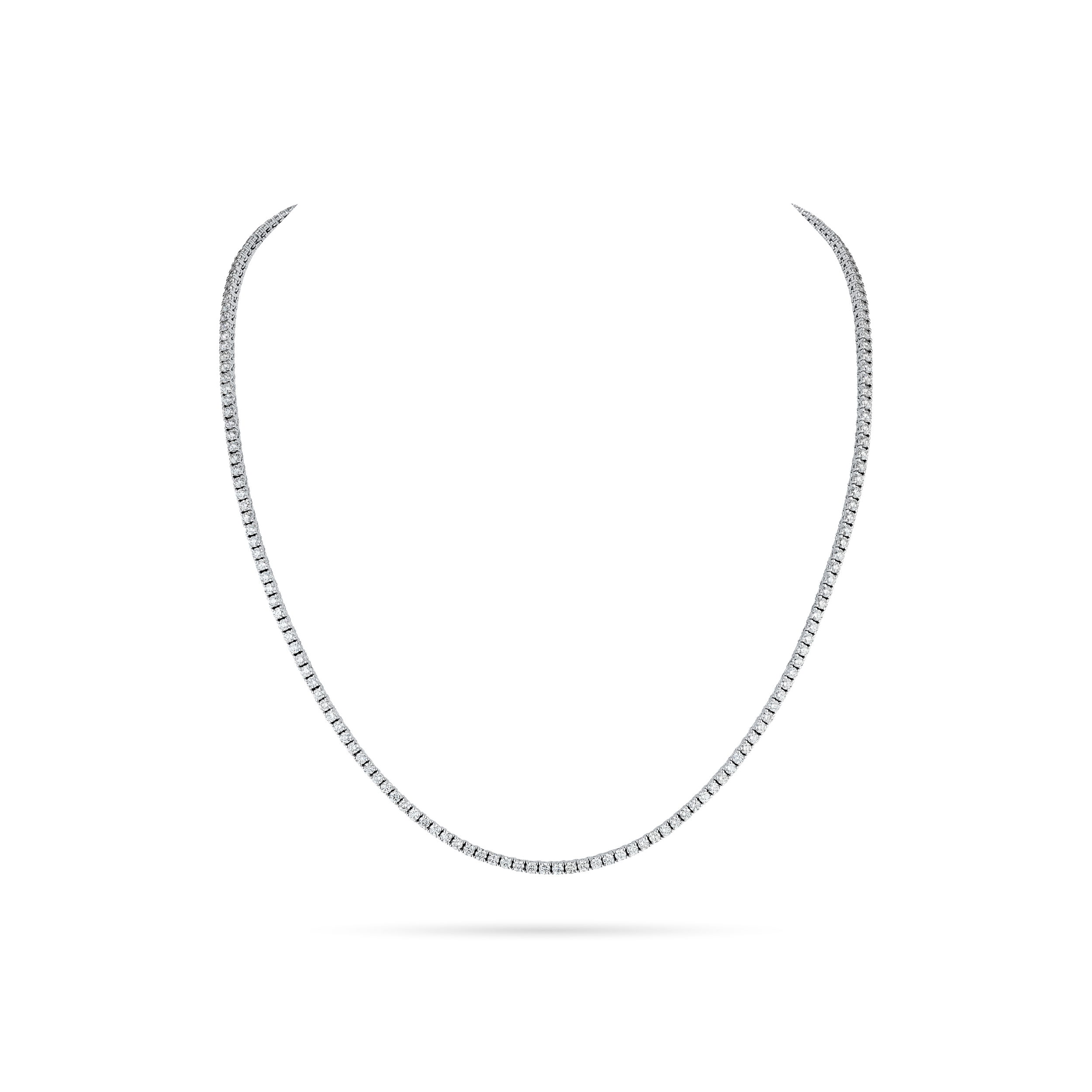 Timeless and refined, this classic line necklace showcases a continuous row of brilliant round diamonds, each meticulously set to maximize sparkle. Perfectly balanced in elegance and simplicity, it’s a versatile piece that transitions effortlessly from everyday sophistication to formal glamour.-18k White gold-Round diamonds, 7.20cts-Length, 18 inchesItem# 165-2000042 Diamond Line Necklace